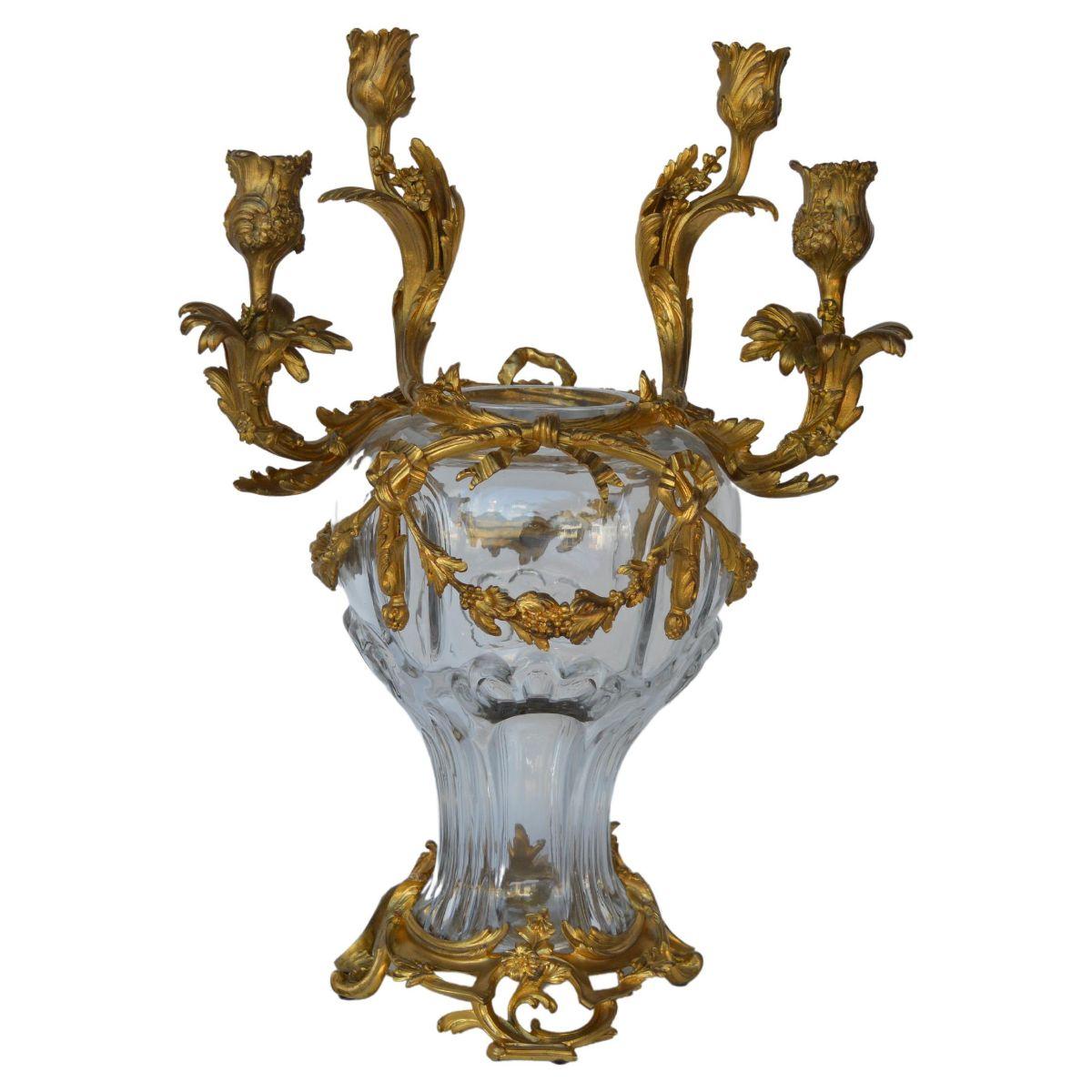 Signed pair of French, 19th Century, Louis XV style glass and gild Ormolu candelabra by Henri Vian.

Henri Vian, (1860-1905) was a celebrated Parisian bronzier, specializing in the production of bronzes in the 18th century style and interior
