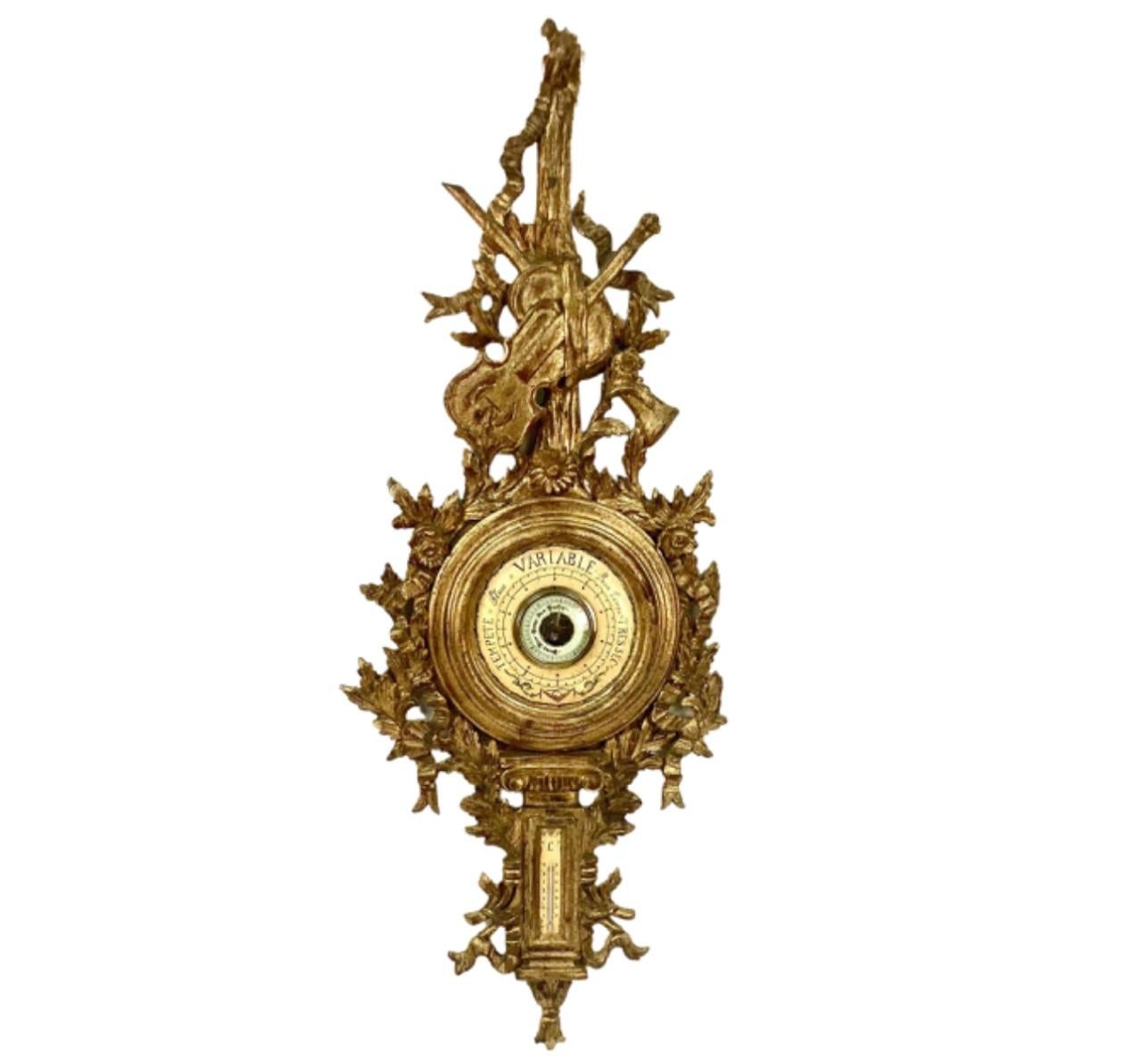 Italienisches Barometer aus vergoldetem Holz im Stil von Ludwig XV. Mit Blattwerk, Bändern und einer Geige gestaltet. Auf der Rückseite gestempelt 