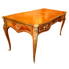 A Louis XV Style ormolu mounted Kingwood and Tulipwood  Bureau Plat or Desk