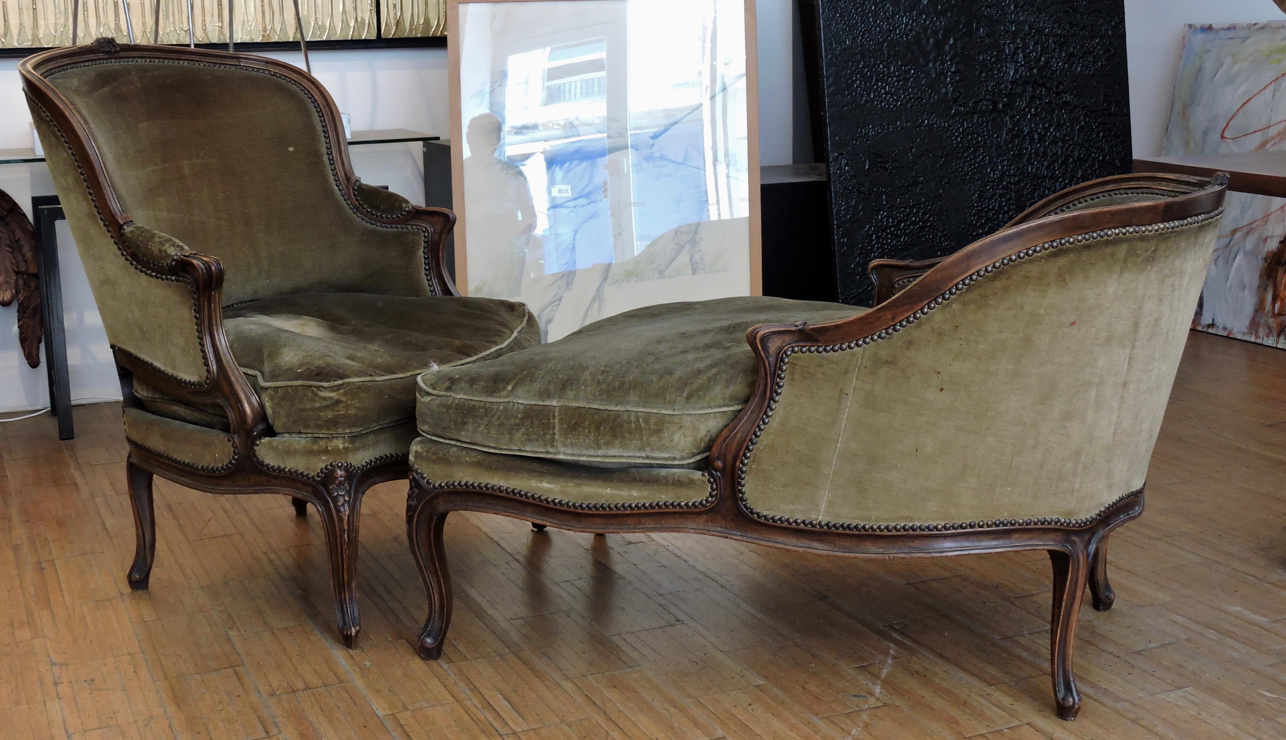A large 19th century Louis XV style natural wood duchesse brisée.