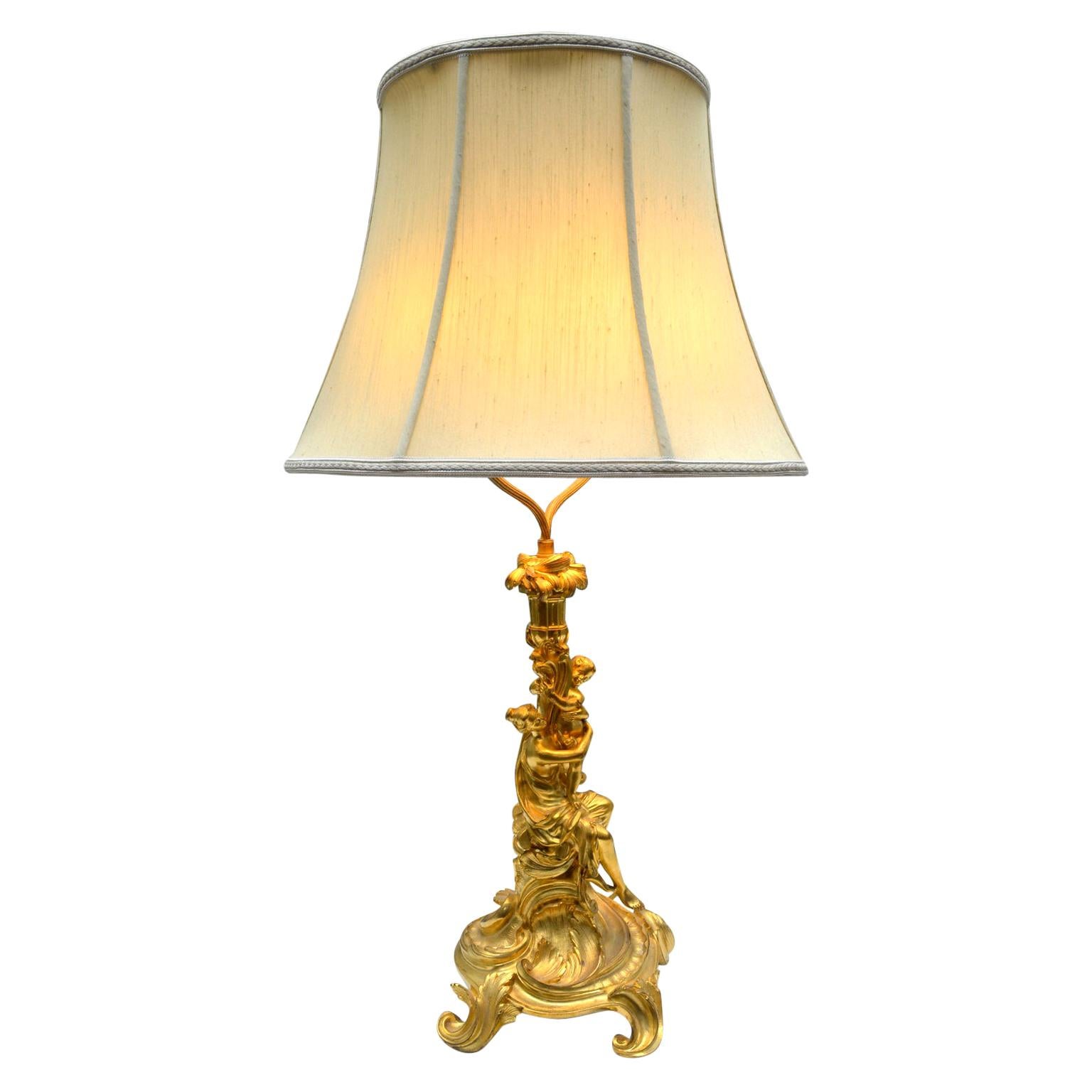 Lampe figurative de style Louis XV du 19ème siècle en bronze doré rococo