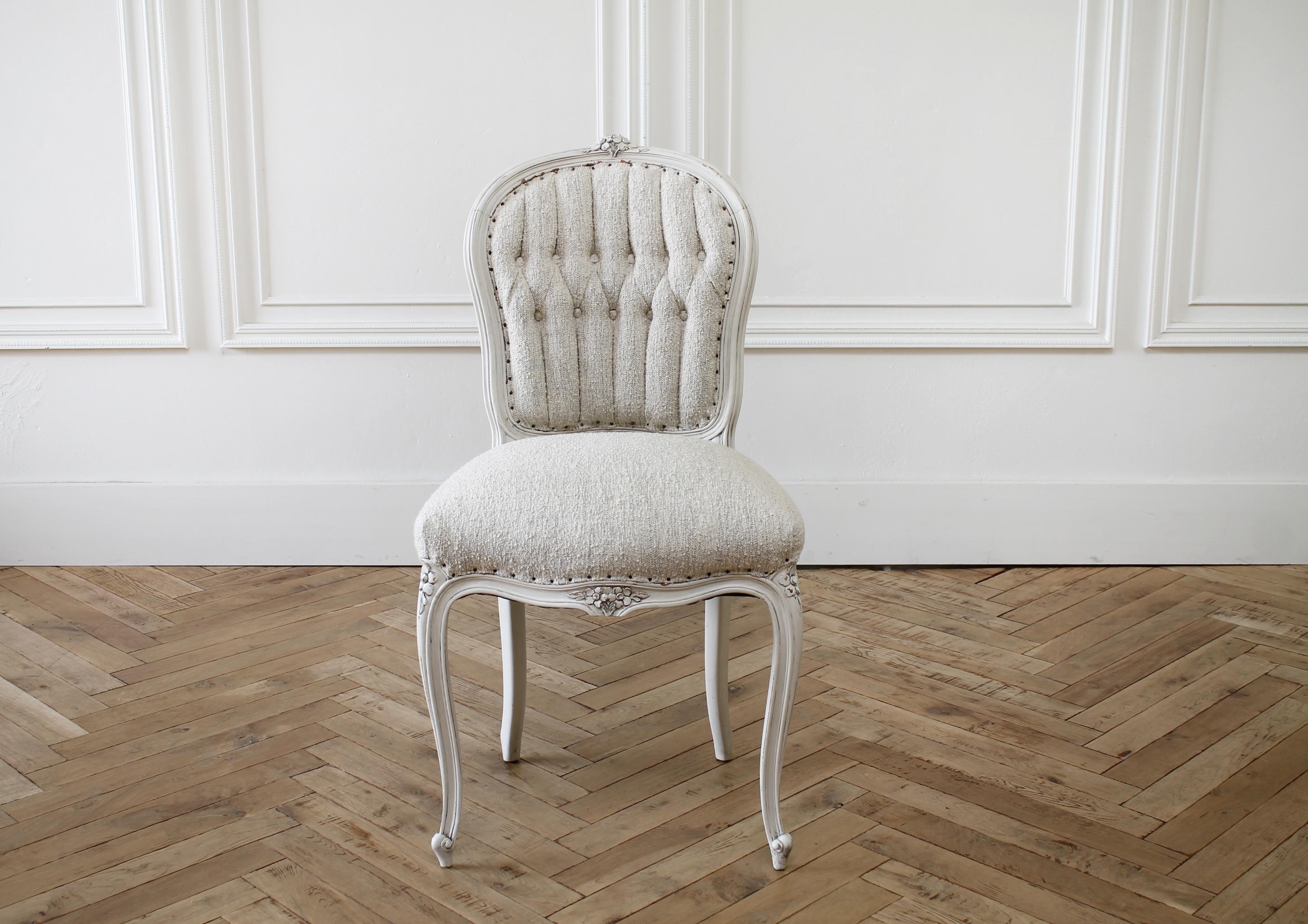 19th century Louis XV style vanity chair in boucle fabric
Painted in our oyster white, with subtle distressed edges, and finished with an antique patina.
Brand new upholstery in a beautiful vintage style boucle that has grey and natural tones