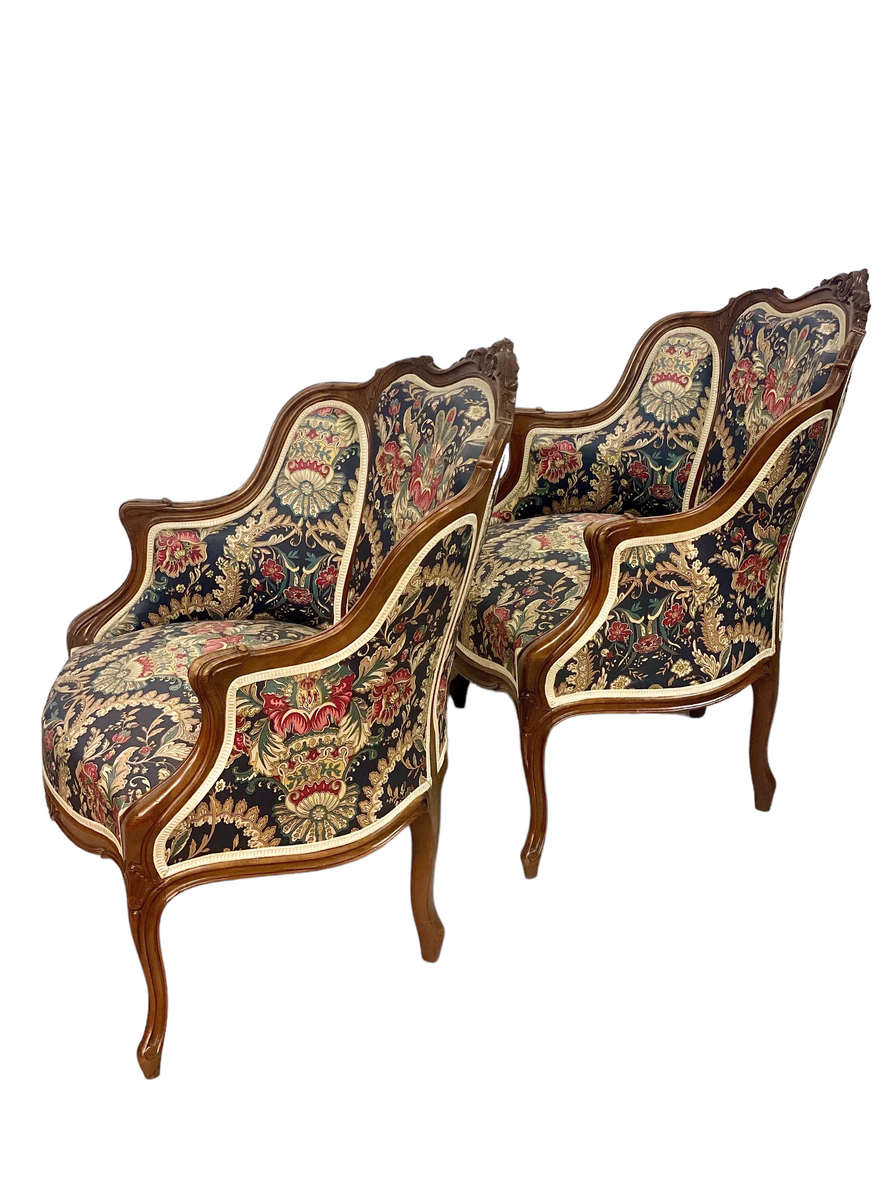 Step into the splendor of Louis XV with these remarkable walnut bergère armchairs dating from the 19th century.
Each chair stands as a testament to meticulous artistry, with its walnut woodwork expertly molded and sculpted, capturing the essence of