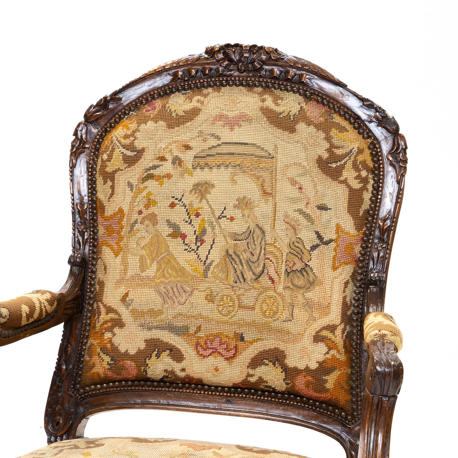 19th Century Louis XV walnut chaise à la reine, with needlepoint covering, well-carved chair frame having a beautiful patina. The chair construction is very sound and the tapestry is in very good condition. There is fraying to the back of the chair