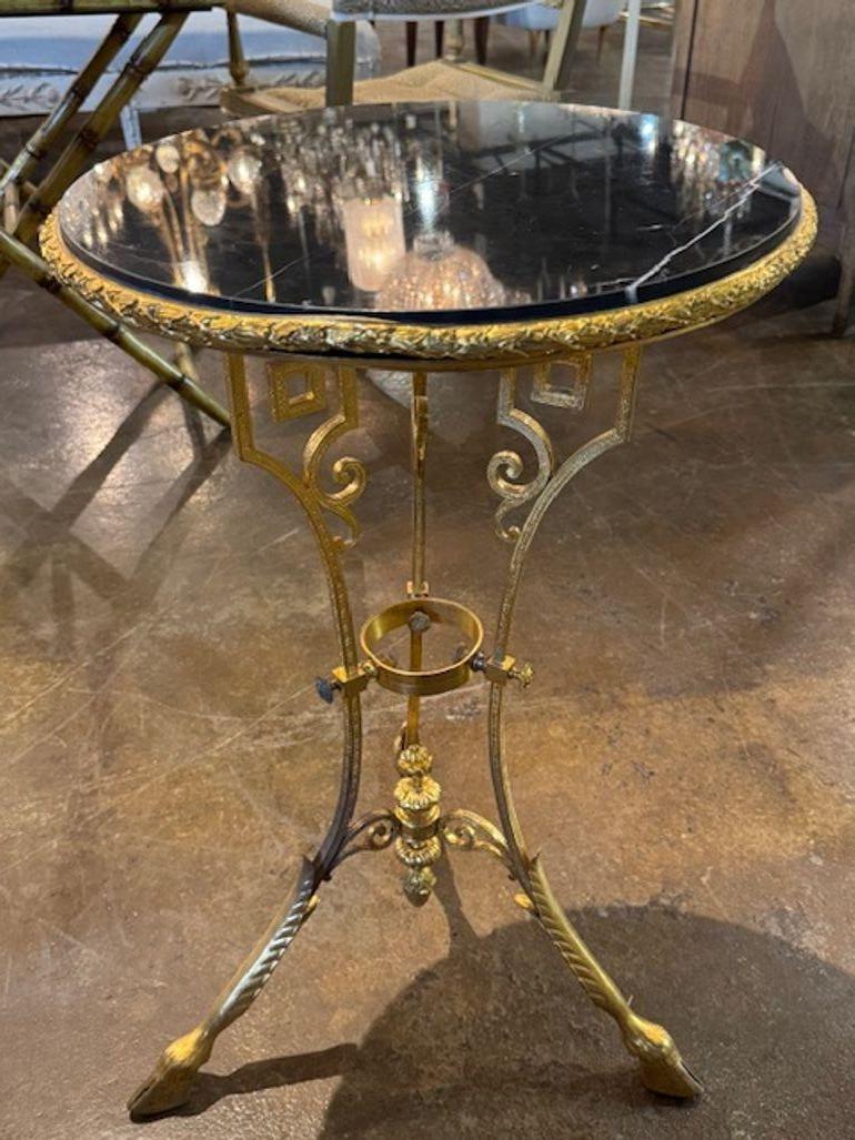 Mesa Luis XVI del siglo XIX de bronce y mármol negro Francés en venta