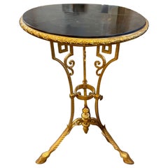 Mesa Luis XVI del siglo XIX de bronce y mármol negro