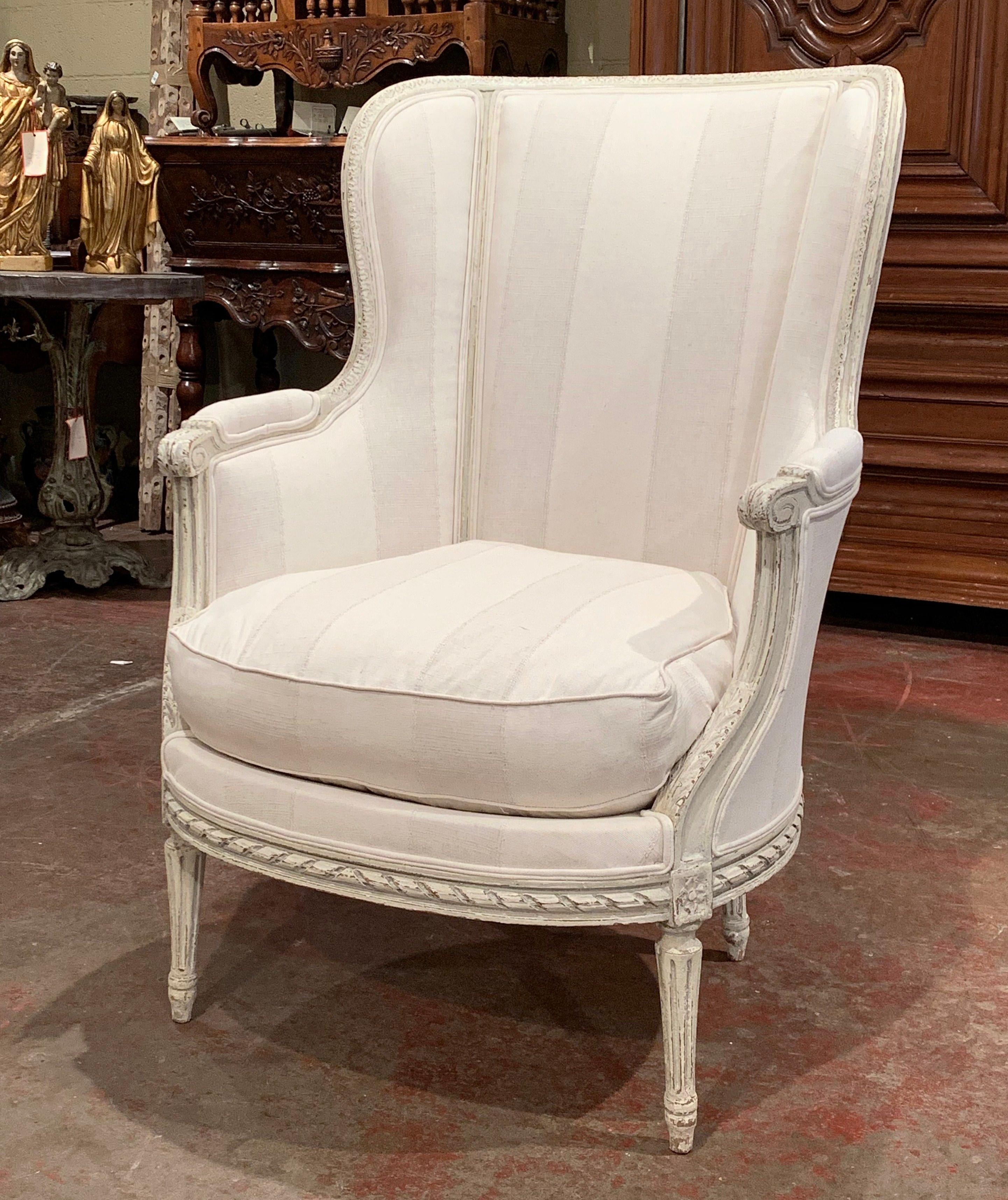 19th Century Louis XVI Carved Painted Bergère Armchair with Striped Fabric In Excellent Condition In Dallas, TX