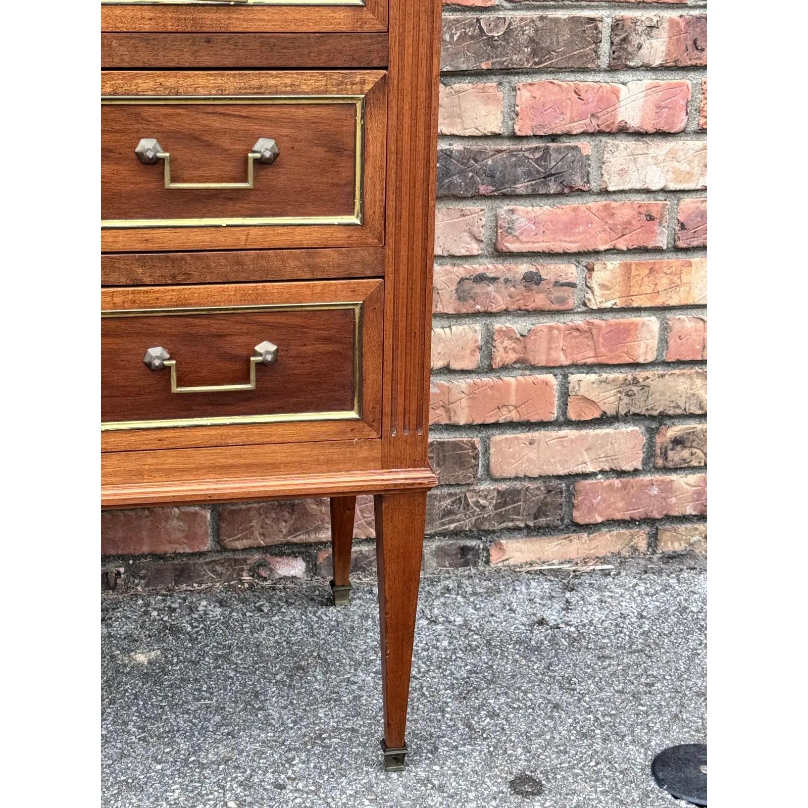19th Century France returns to your home! This dresser's warm colors and simple elegance make it versatile for any design preferences. All three drawers, furnished with brass drop-pull handles, work effortlessly for ease of storage. 

Dimensions 
36