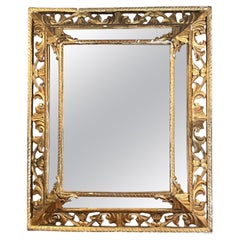 Miroir antique doré Louis XVI du 19ème siècle
