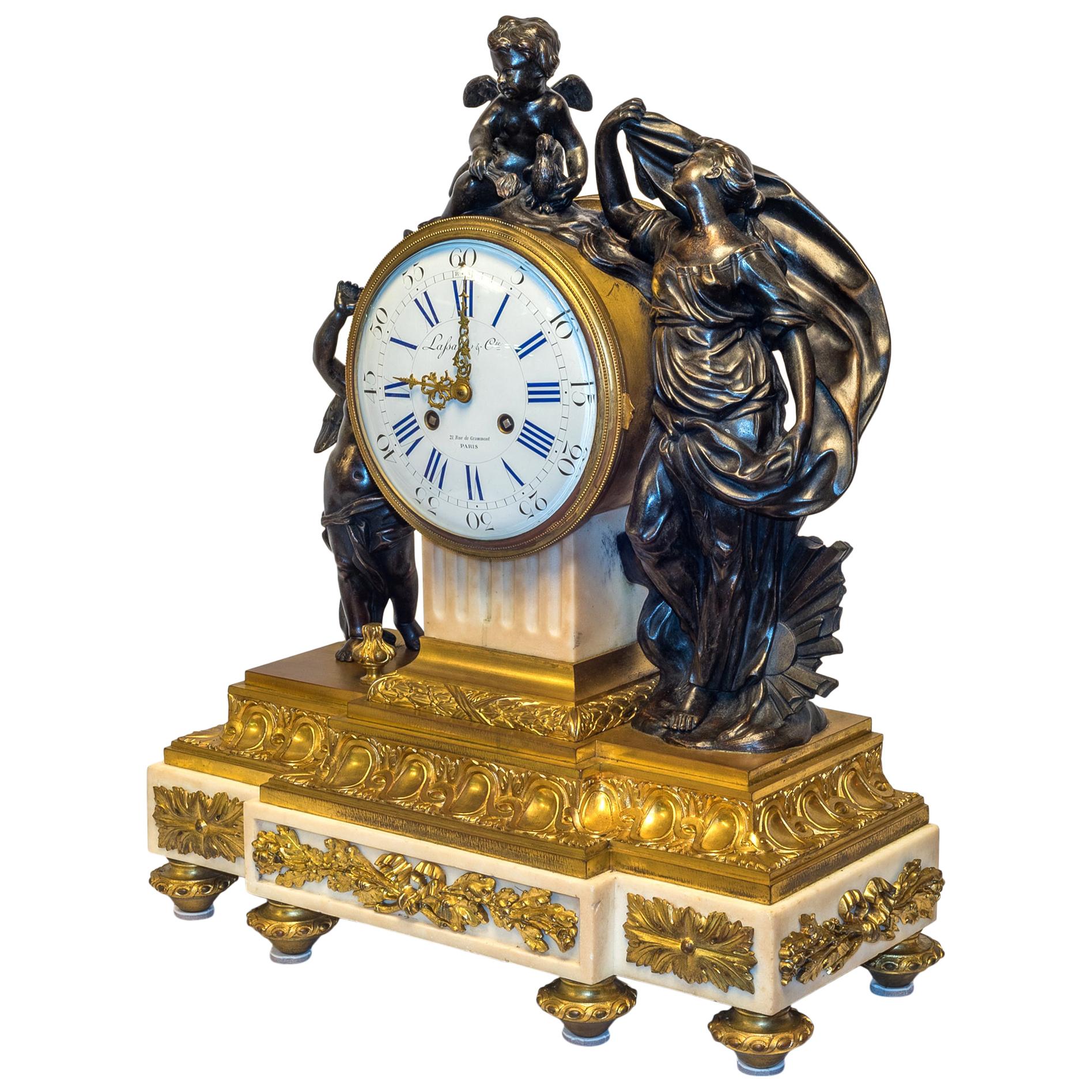 19th Century Louis XVI Gilt and Patinated Bronze Figural Mantel Clock