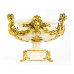 Centro de mesa de ónice montado en bronce dorado Luis XVI del siglo XIX