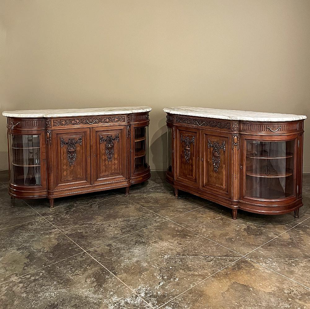 19th Century Louis XVI marble top walnut display buffet by Kint of Gand is a stunning piece that will immediately command admiration from all who enter the room in which it is displayed! Hand-crafted by Edouard Kint, a fine furniture maker in the