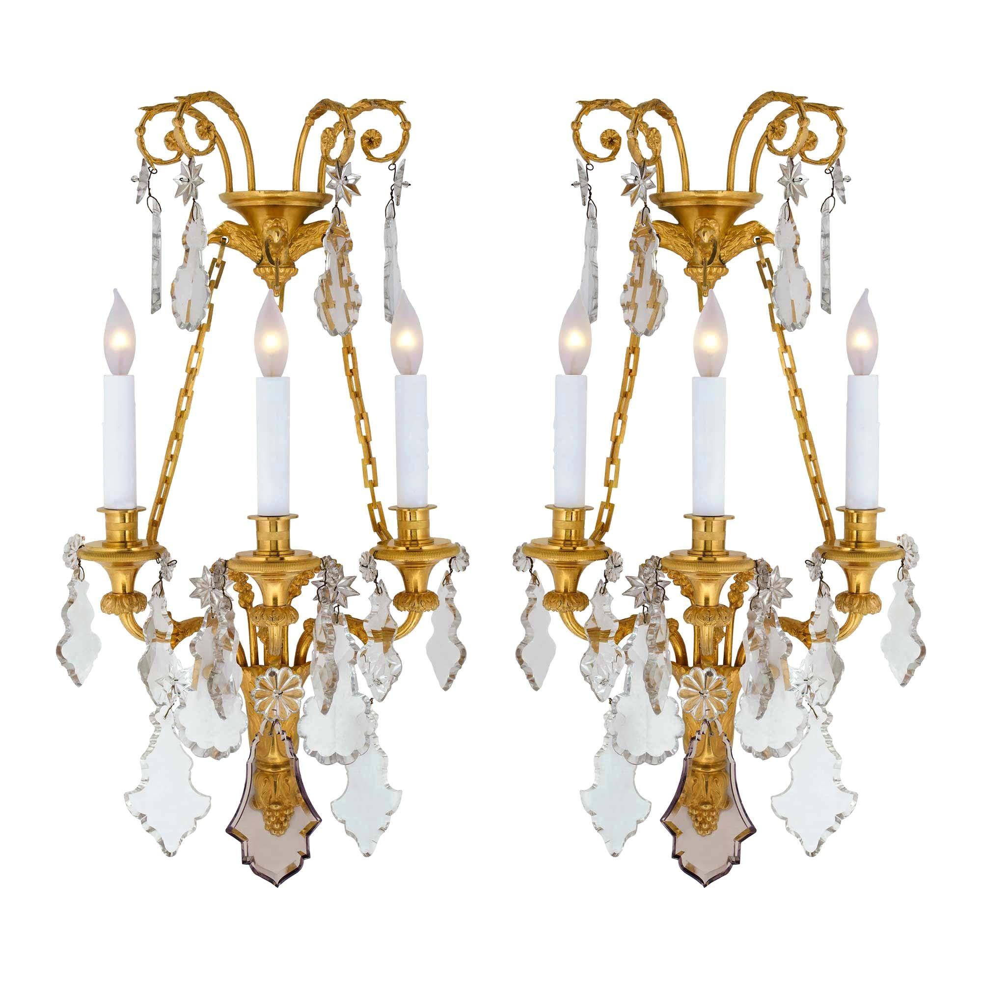 19th Century Louis XVI Style Baccarat Crystal and Ormolu Three-Light Sconces For Sale