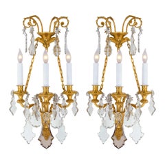 19th Century Louis XVI Style Baccarat Crystal and Ormolu Three-Light Sconces