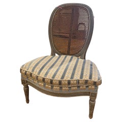 Used 19th Century Louis XVI style Cane Back Fireside Chair