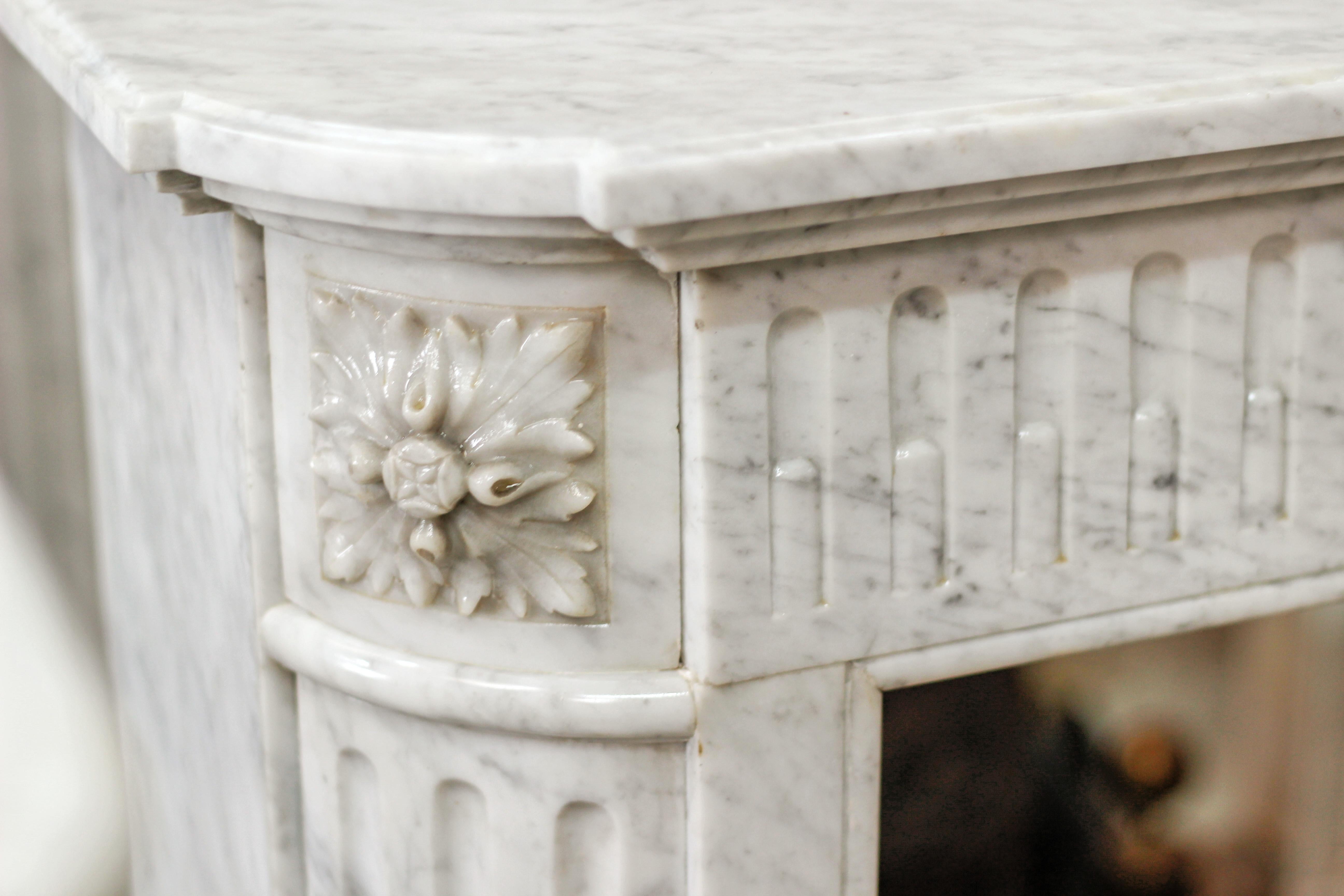 Carved 19th Century Louis XVI Style Fireplace in White Carrara Marble