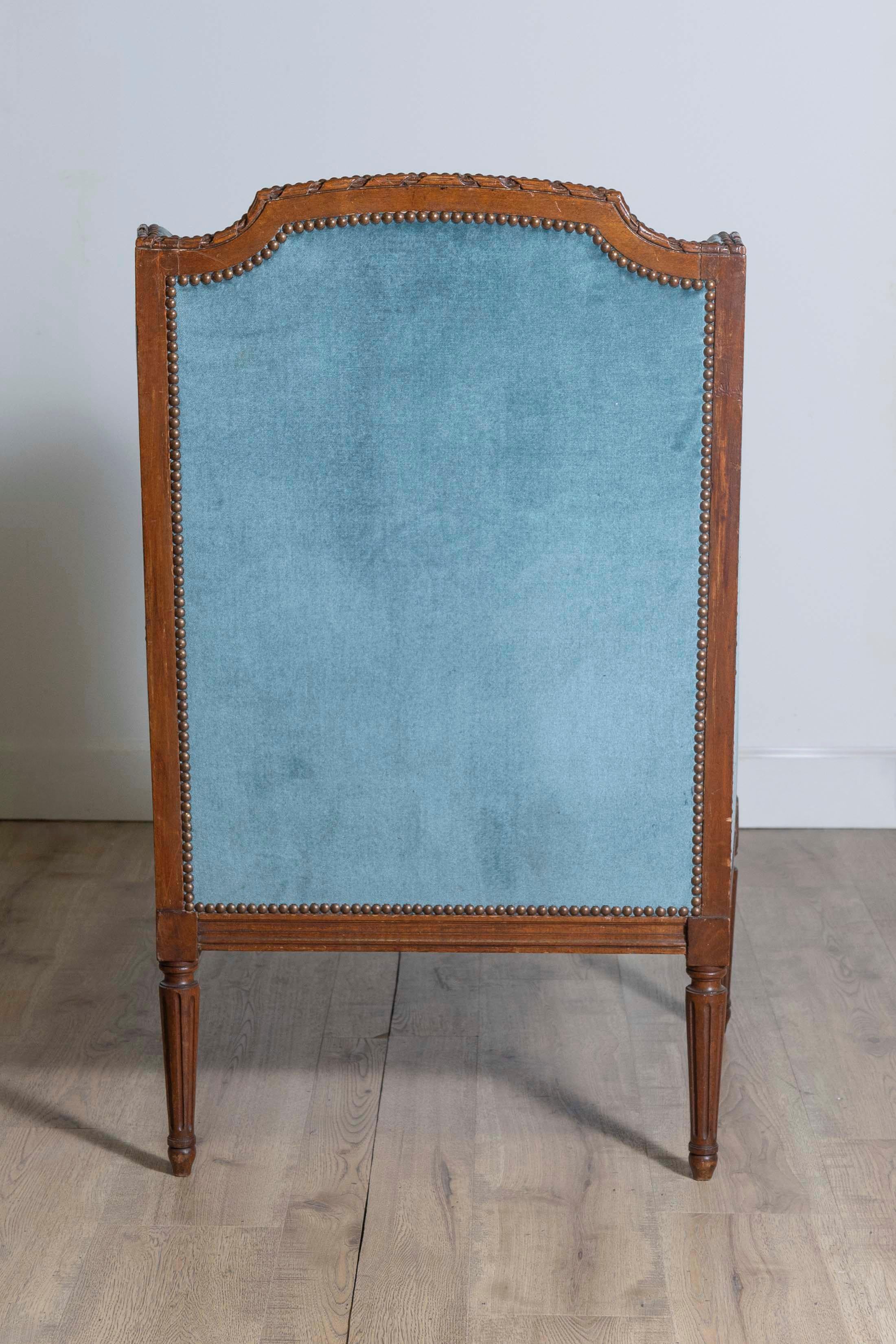 Upholstery 19th Century Louis XVI Style French Walnut Bergère à Oreilles with Carved Décor For Sale