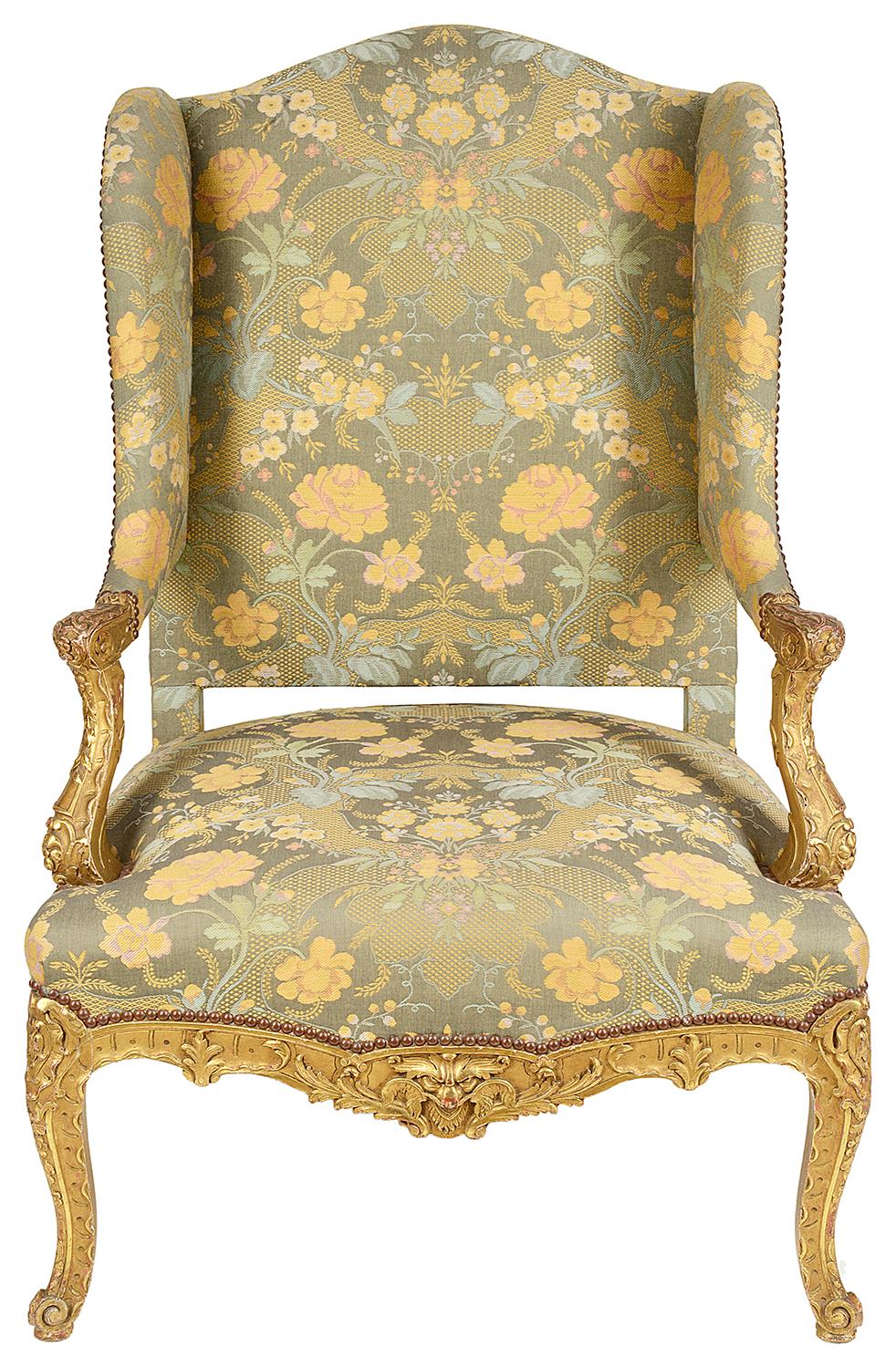 A very good quality 19th Century Louis XVI style wing armchair. Having carved and gilded foliate decoration to the show frame and raised on scrolling cabriole legs.