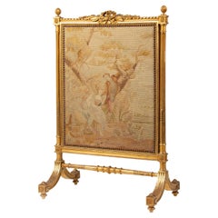 Pare-tincelles de style Louis XVI du 19me sicle en bois dor avec tapisserie