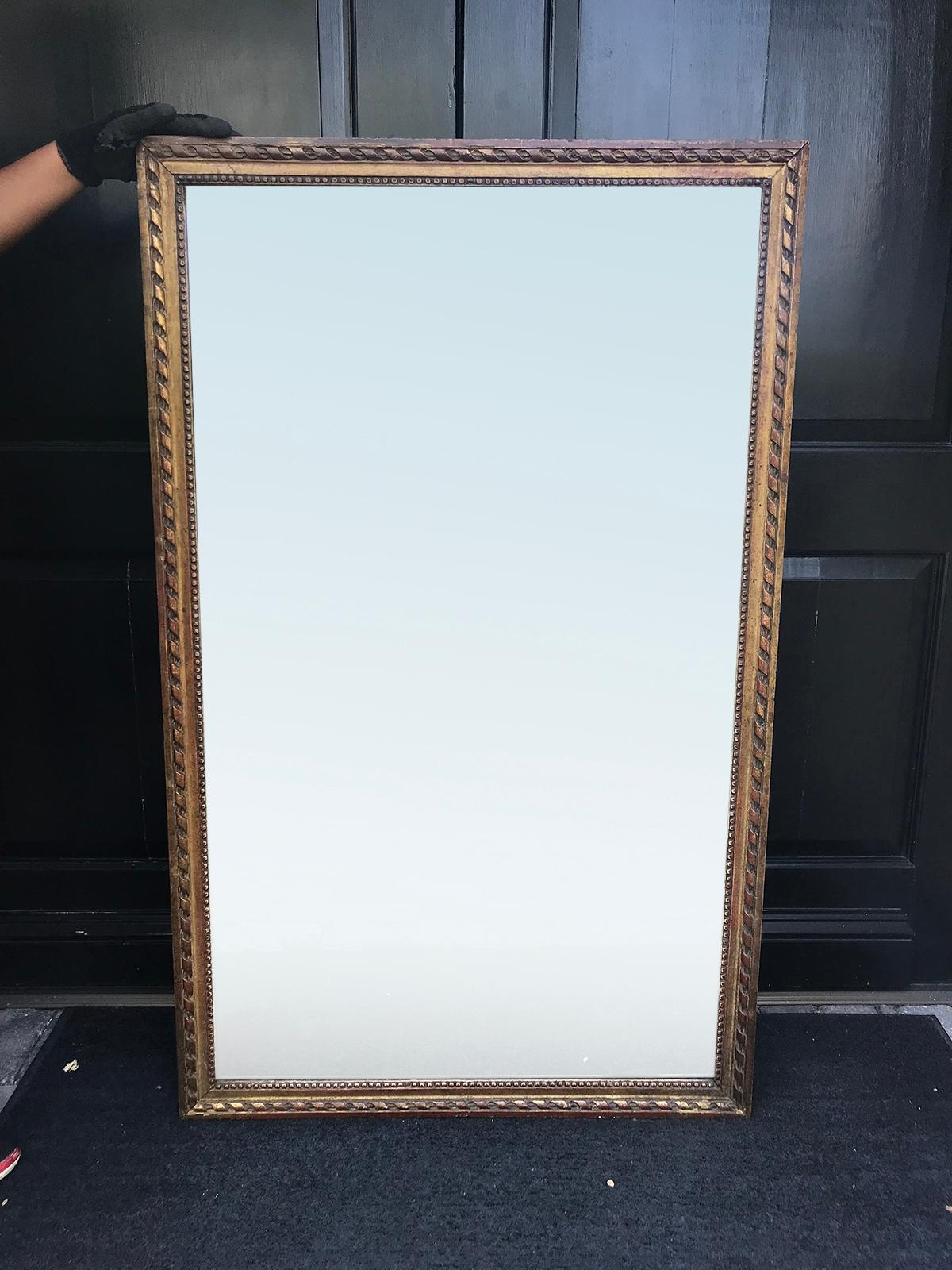 19th century Louis XVI style giltwood mirror, probably with old mirror.
