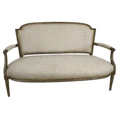 Settee de style Louis XVI du 19ème siècle en bois doré 