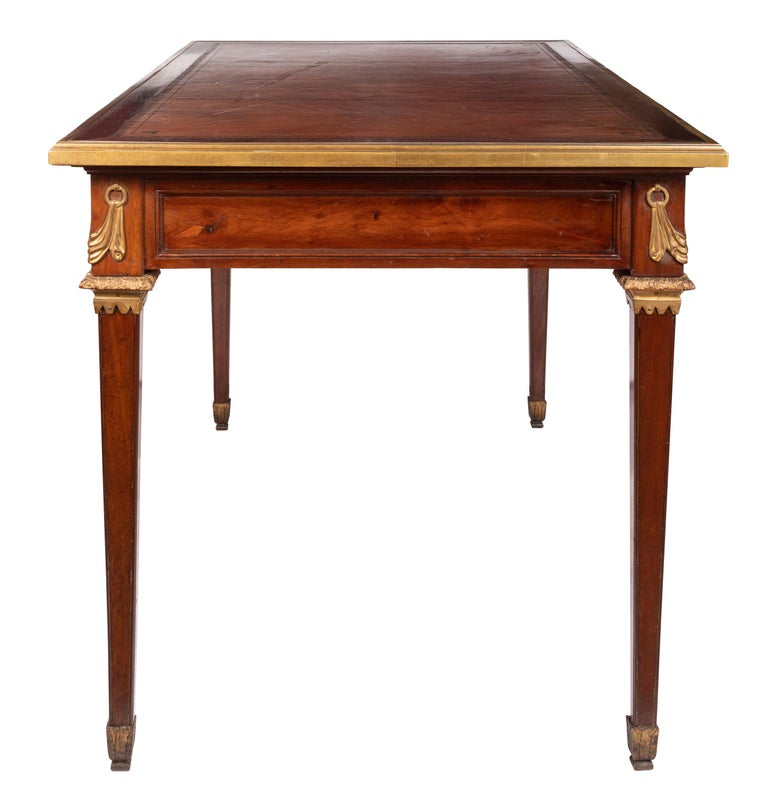 A 19th century Louis XVI style French writing table or desk, known as a 