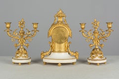 19th Century Louis XVI Style Mantle Clock and Candelabras