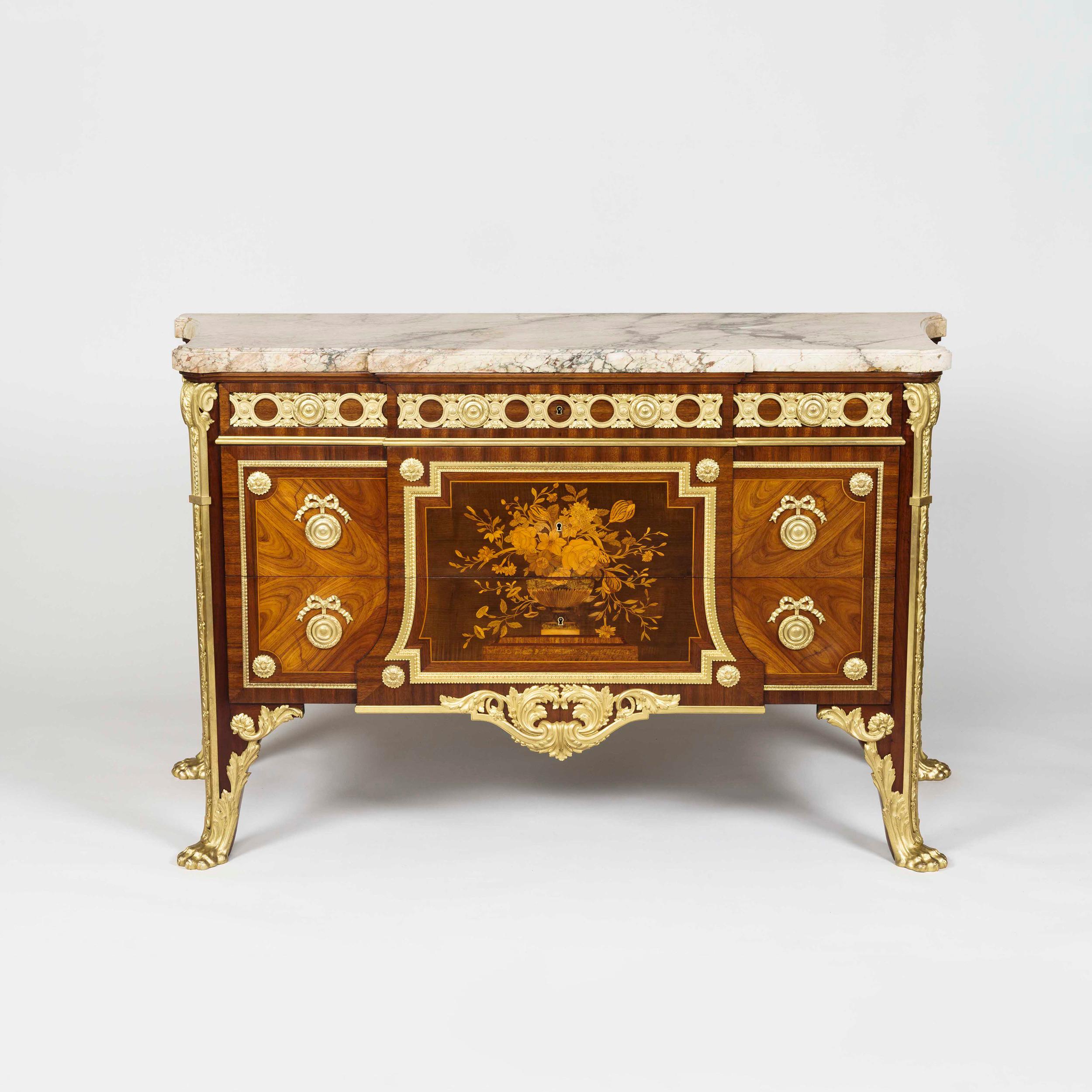 A very fine Louis XVI style gilt-bronze mounted marquetry commode
After the design by Jean-Henri Riesener (1734-1806)

After a model by Jean-Henri Riesener, supplied to Princess Adélaïde for Versailles. Constructed from amaranth with veneered