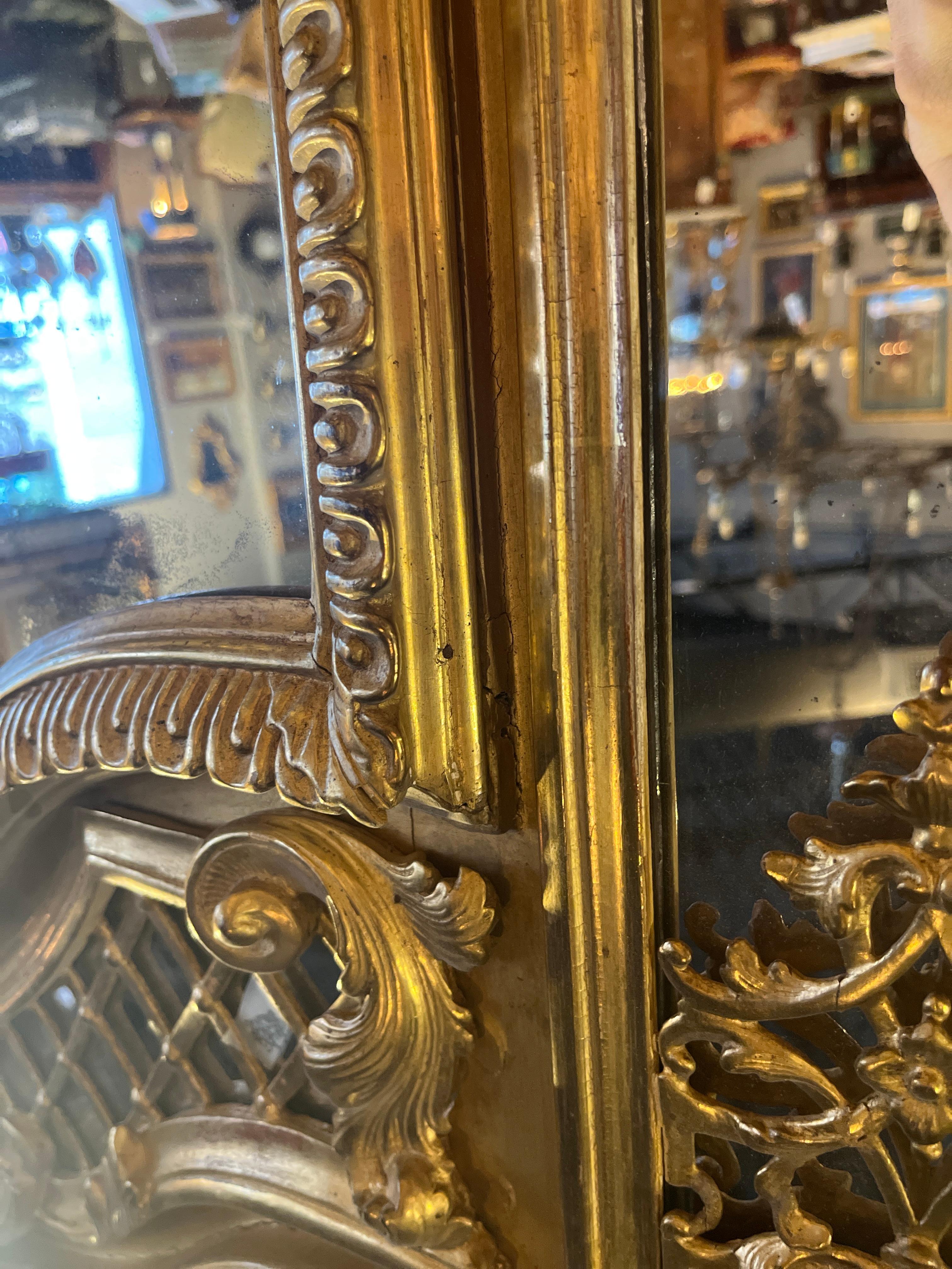 Verre Miroir Trumeaux de style Louis XVI du 19ème siècle avec dorure d'origine en vente