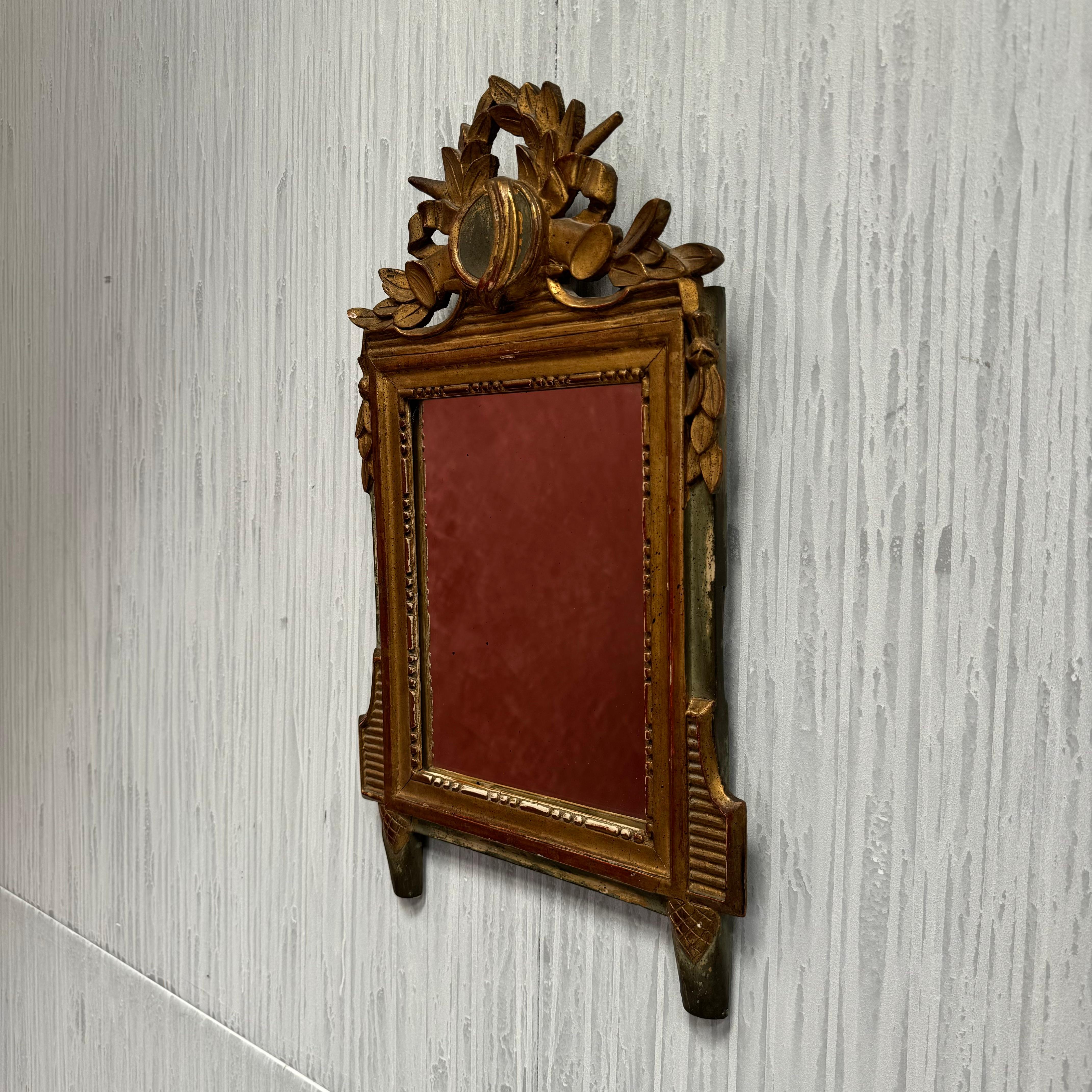 A late 19th Century Louis XVI style French giltwood bridal/marriage mirror
Original giltwood surface and mirror plate
In good condition