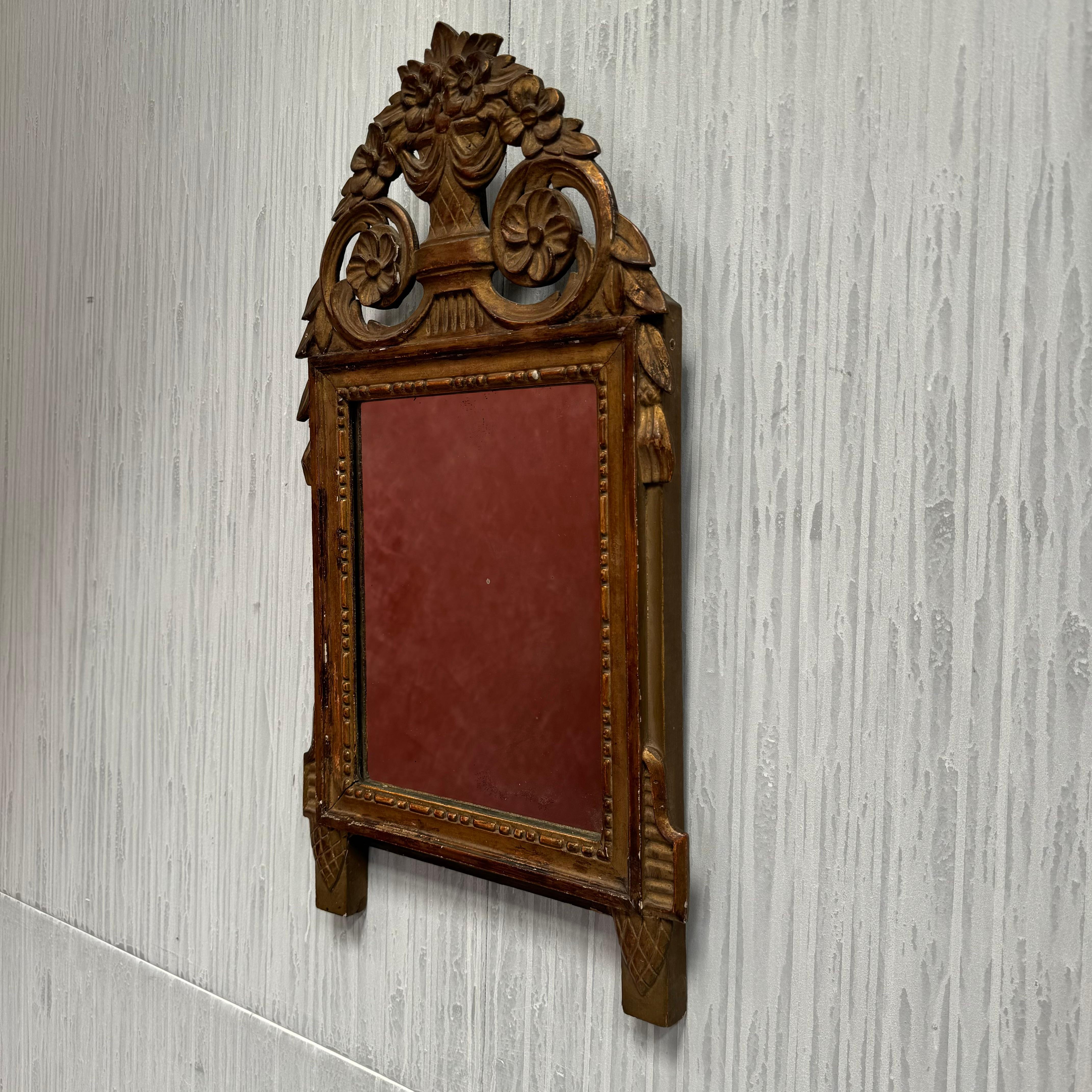 A late 19th Century Louis XVI style French giltwood bridal/marriage mirror
Original giltwood surface and mirror plate
In good condition