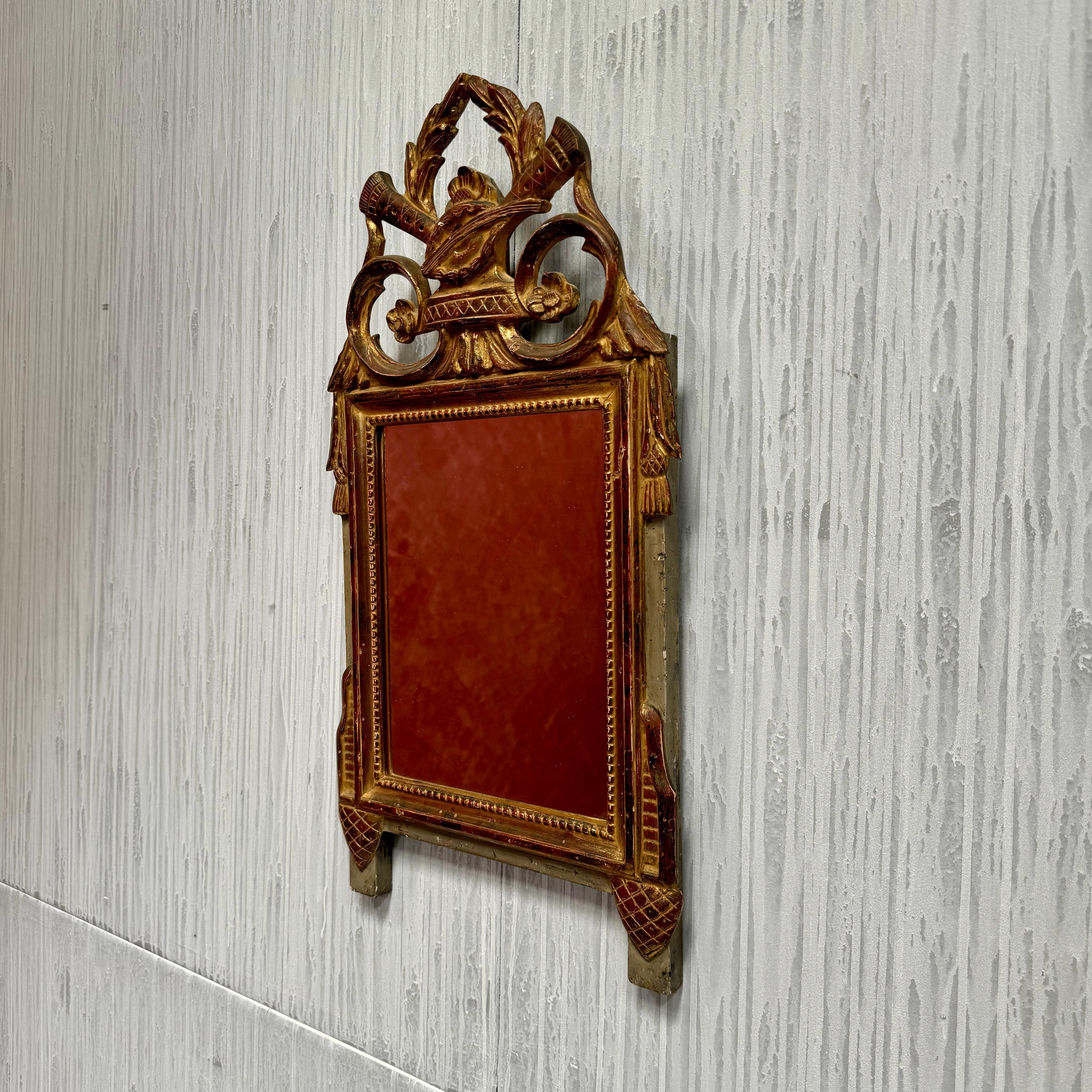 A late 19th Century Louis XVI style French giltwood bridal/marriage mirror
Original giltwood surface and mirror plate
In good condition