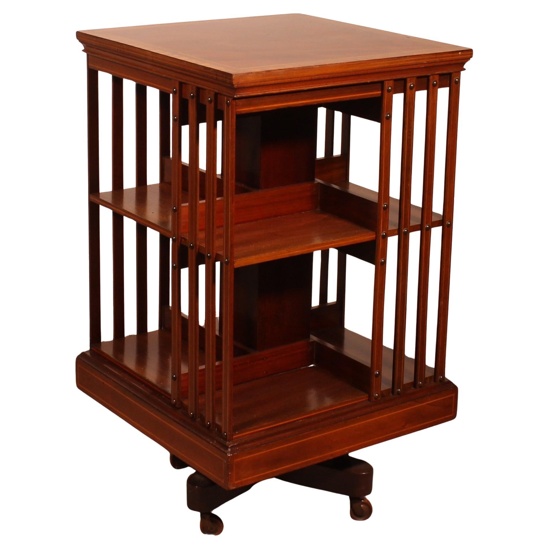 19th Century Mahogany And Inlaid Revolving Bookcase With Iron Base