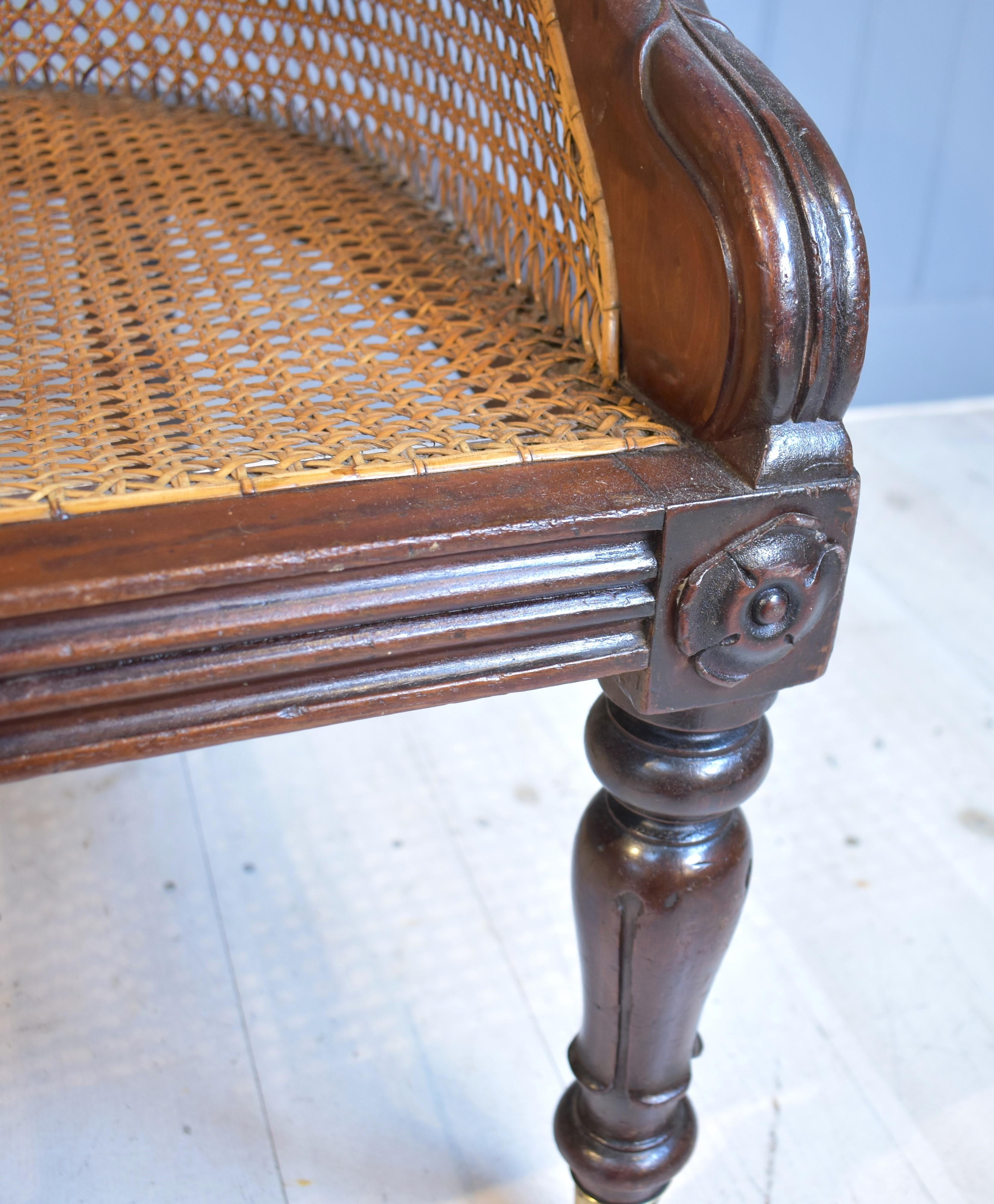 English 19th century mahogany bergere library cane chair