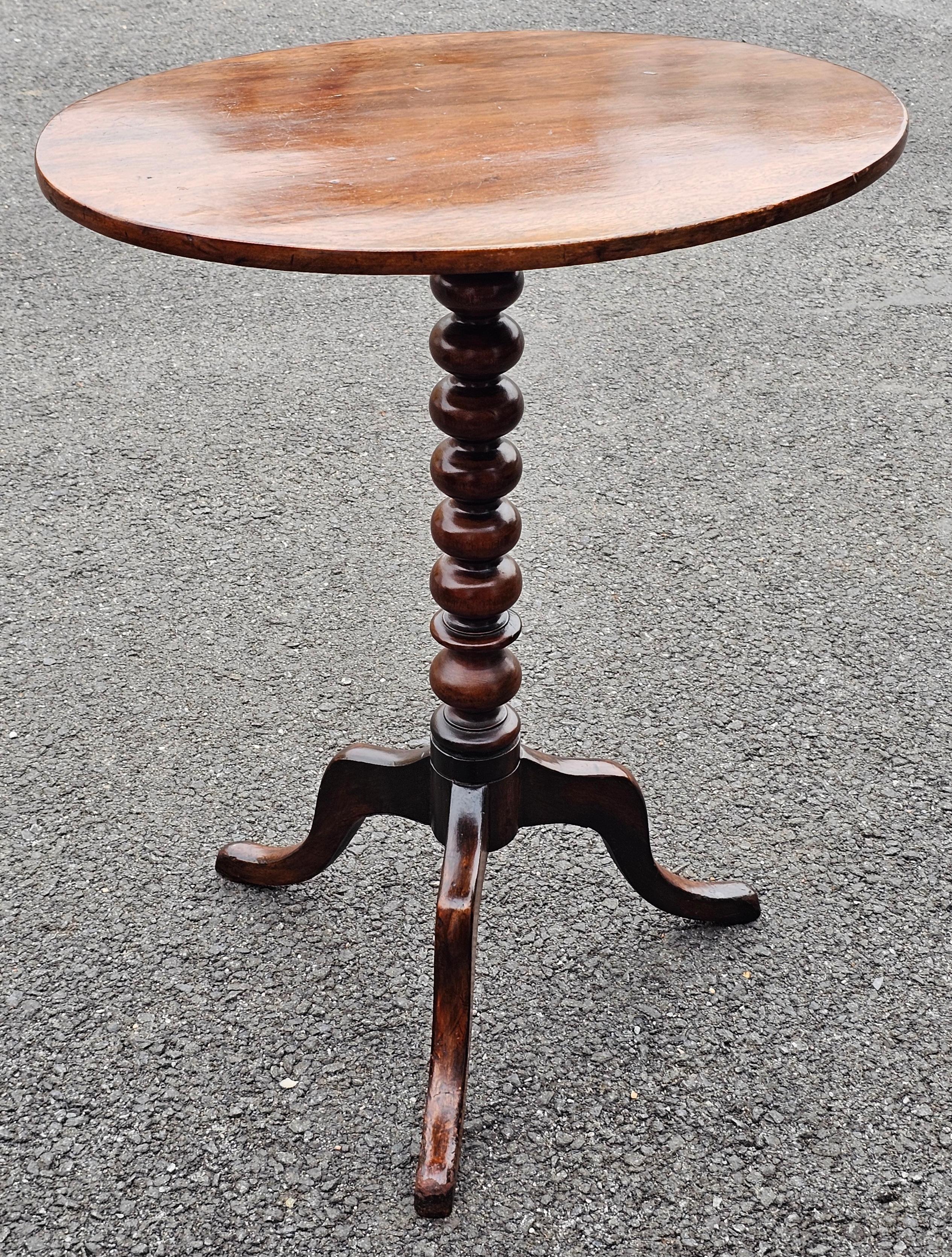 A late 19th Century Mahogany Bobbin Pedestal Oval Side Table Candle Stand
 Measures 21.25