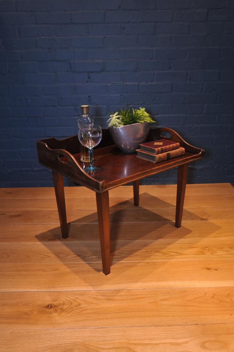 19th century mahogany Campaign butlers tray with folding lock-in legs

- Wonderful tray for drinks or collectibles in any modern or travel inspired setting
- Handmade dovetail corner details.