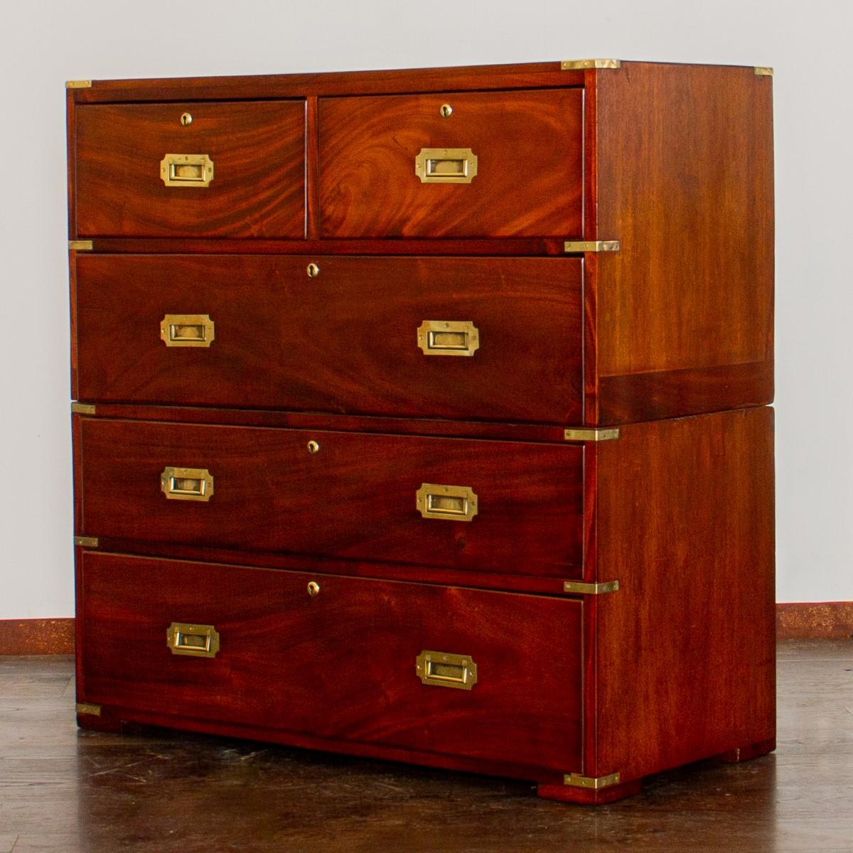 A 19th century Campaign chest with two short and three long drawers, furnished with original brass flush handles and carrying handles to the sides.  

Campaign or Military furniture was popular in the 19th and 20th centuries, when military