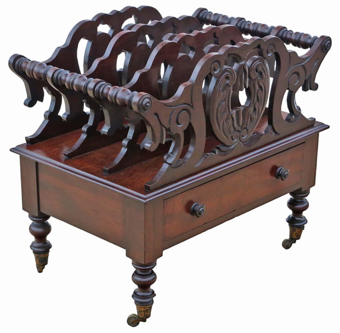 Introducing a remarkable 19th Century Mahogany Canterbury Magazine Rack, boasting exquisite craftsmanship and timeless elegance.

This charming piece is brimming with age, charm, and character, standing gracefully on period ormolu brass castors. Its