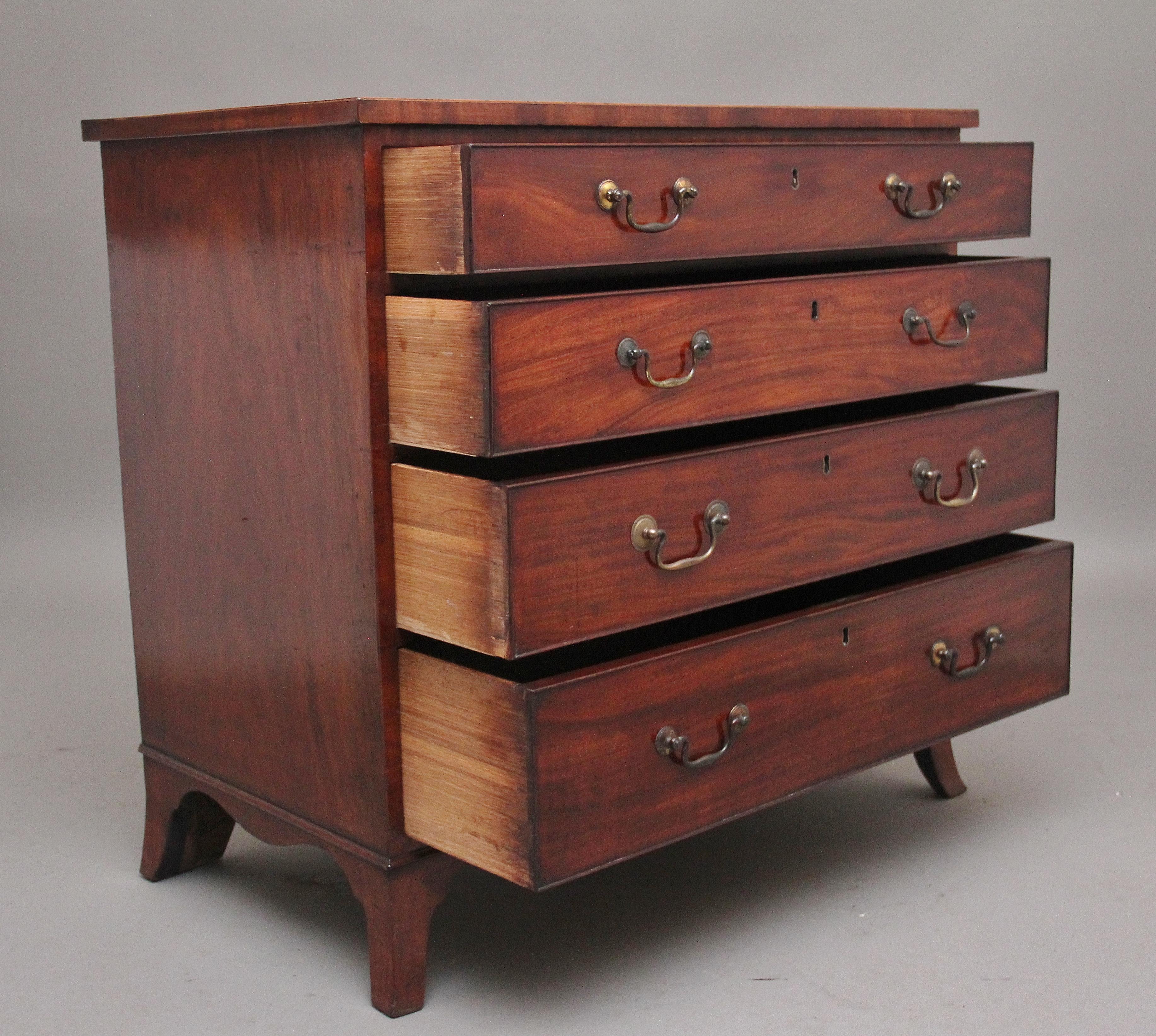 19th century Mahogany chest of drawers, having a nice figured top with inlay around the edge, four graduated oak lined drawers with the original brass swan neck handles, shaped apron, supported on splay feet. circa 1840.