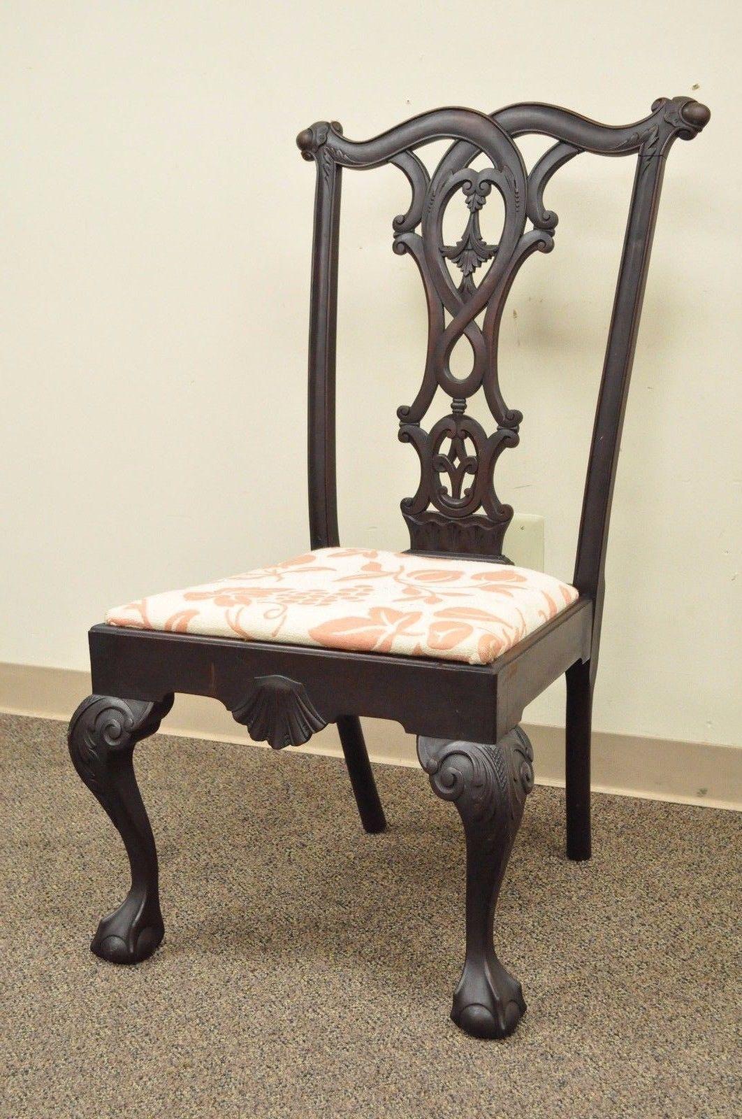 Antique 19th century solid mahogany Chippendale style shell carved side chair. Item features solid wood frame, ball and claw feet, carved knees, shell carved skirt, interlocking designed backsplat, a true antique chair, circa 18th century.