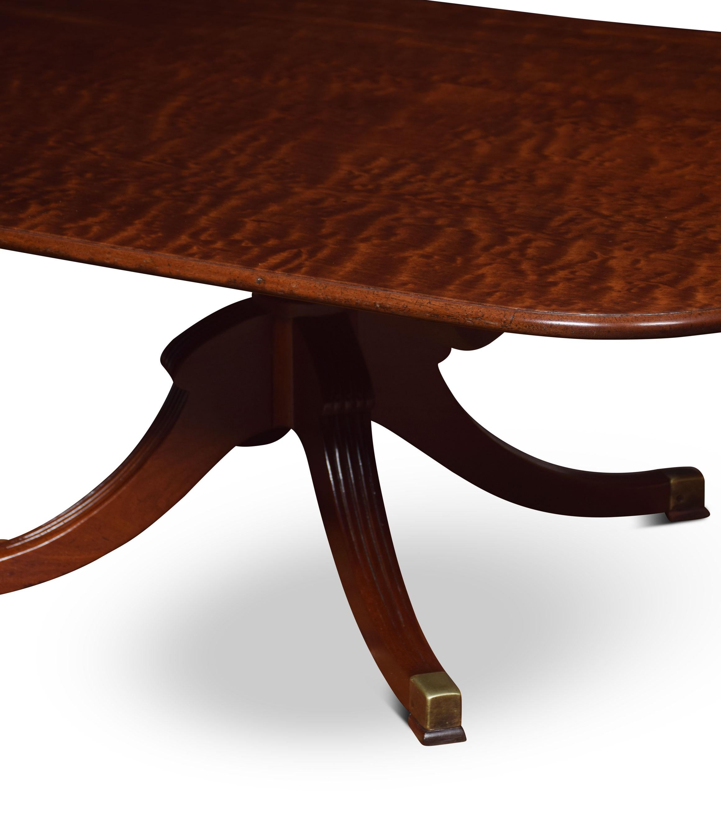 19th century mahogany coffee table, the rectangular top raised on a pedestal base and four out swept legs. This table has been reduced to coffee table height
Dimensions:
Height 22 inches
Width 54.5 inches
Depth 37 inches.