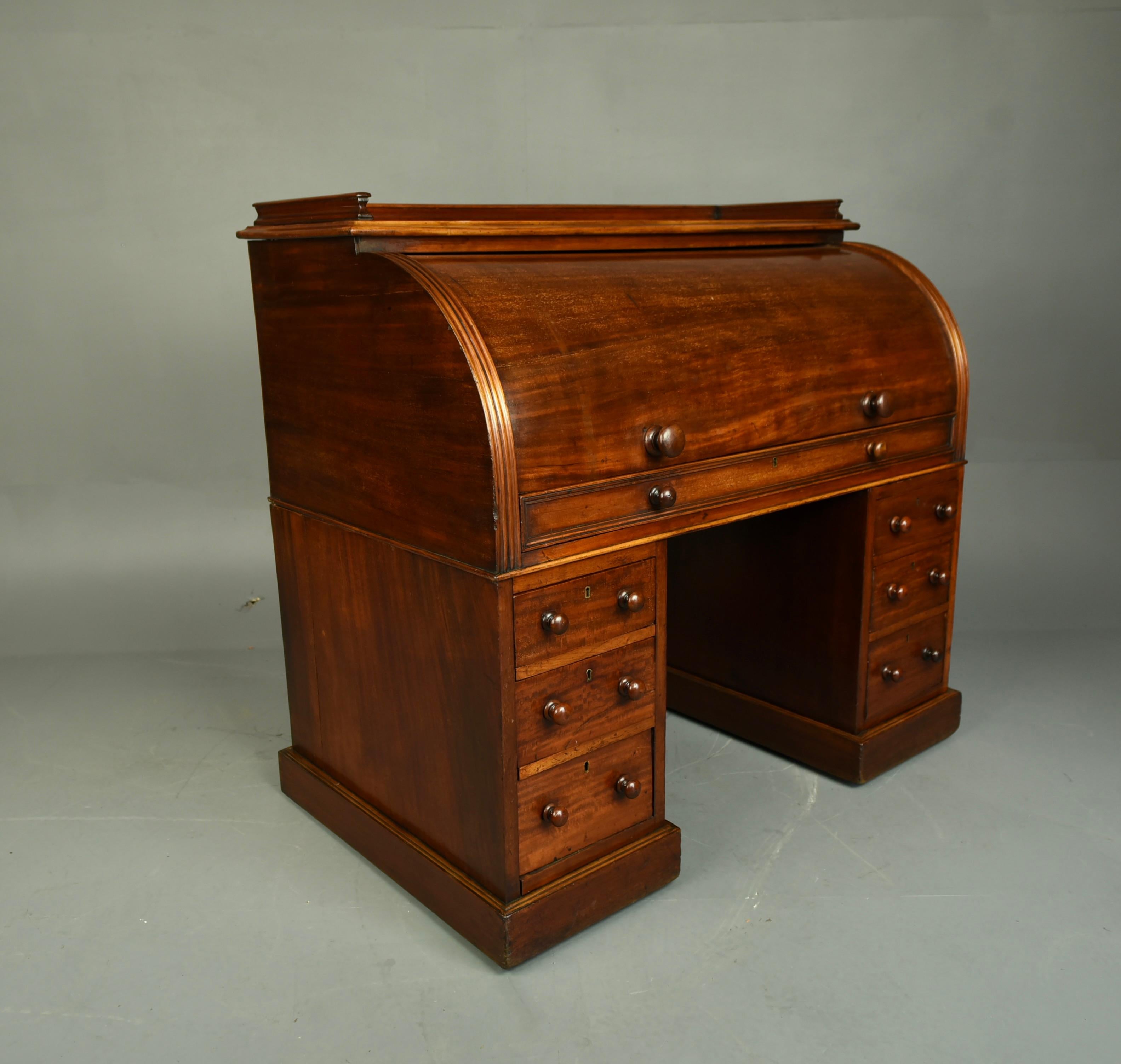 English 19th century mahogany cylinder top pedestal desk secretary