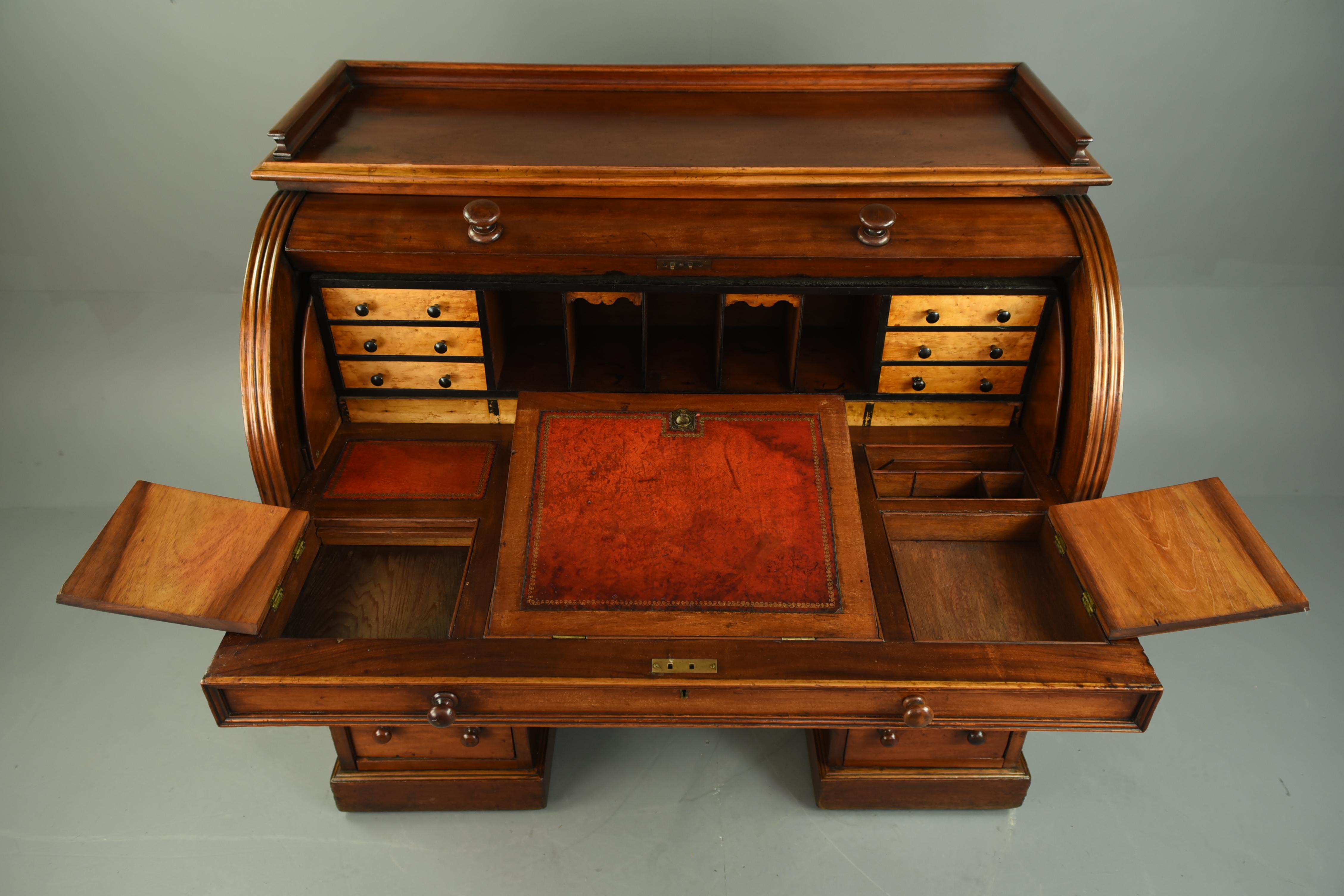Mahogany 19th century mahogany cylinder top pedestal desk secretary
