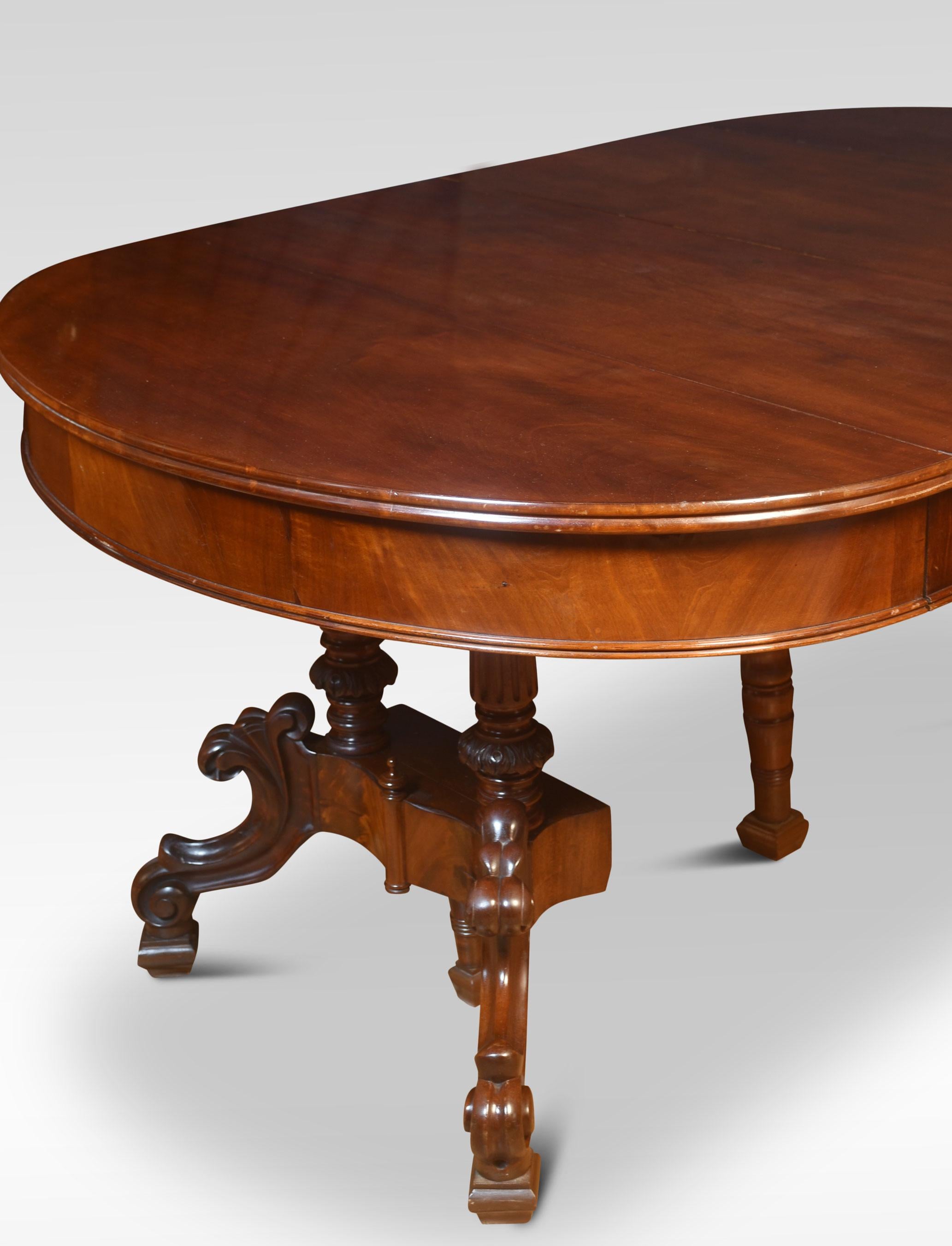 Mahogany dining table the oval top opening to incorporate two leaves, raised on a centre cluster column and scrolling legs.
Dimensions
Height 32.5 Inches
Width 37 Inches when open 75 Inches
Depth 50 Inches