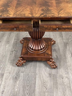 19th Century Mahogany Drop-Leaf Table, Carved Base, Elegant Design