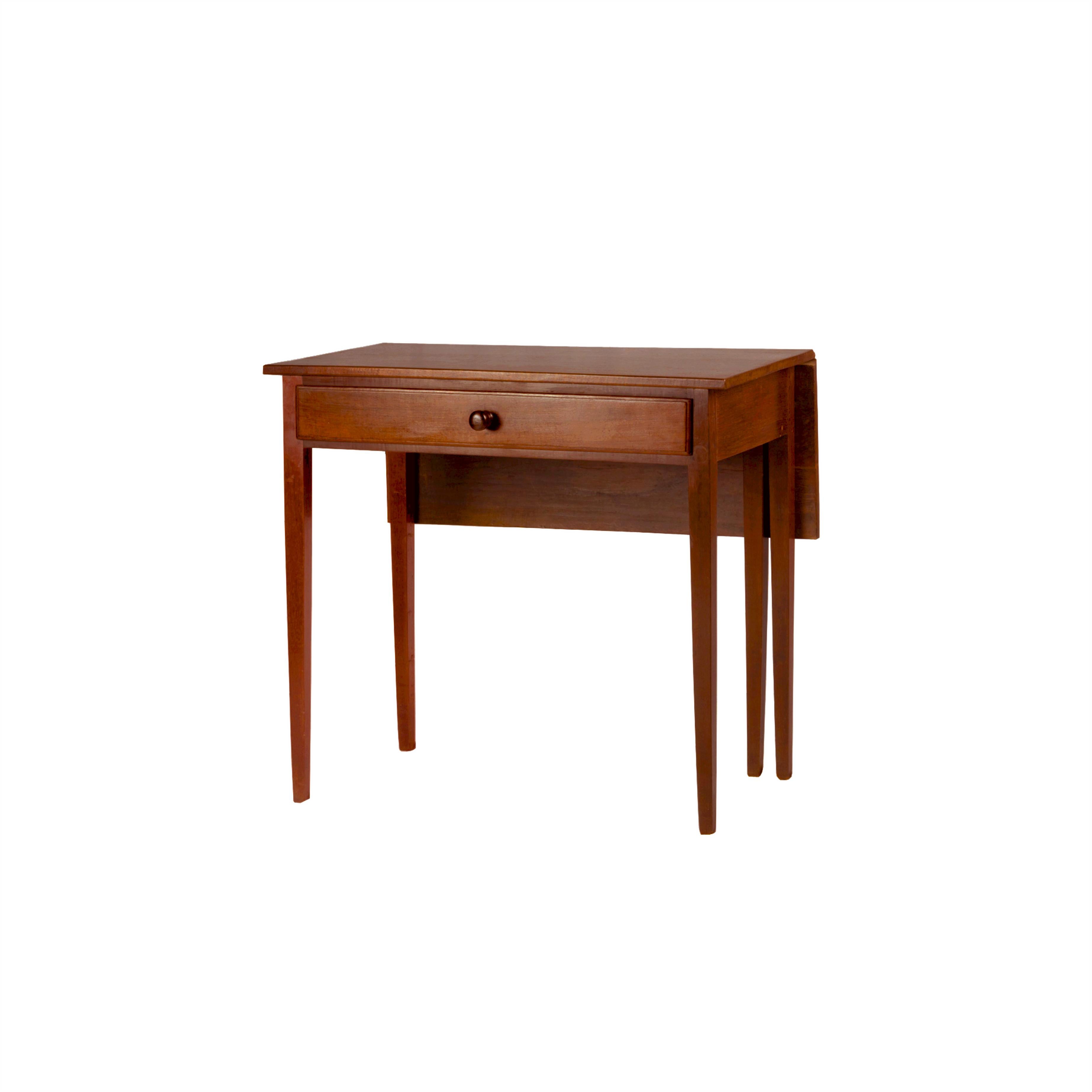 A beautiful Portuguese drop leaf side table with 5 legs in mahogany from Madeira. Flap, box and straight leg, drawer and folding top in Queen Maria the First Portuguese style, highly inspired by the British lines with a bit of exuberance from the