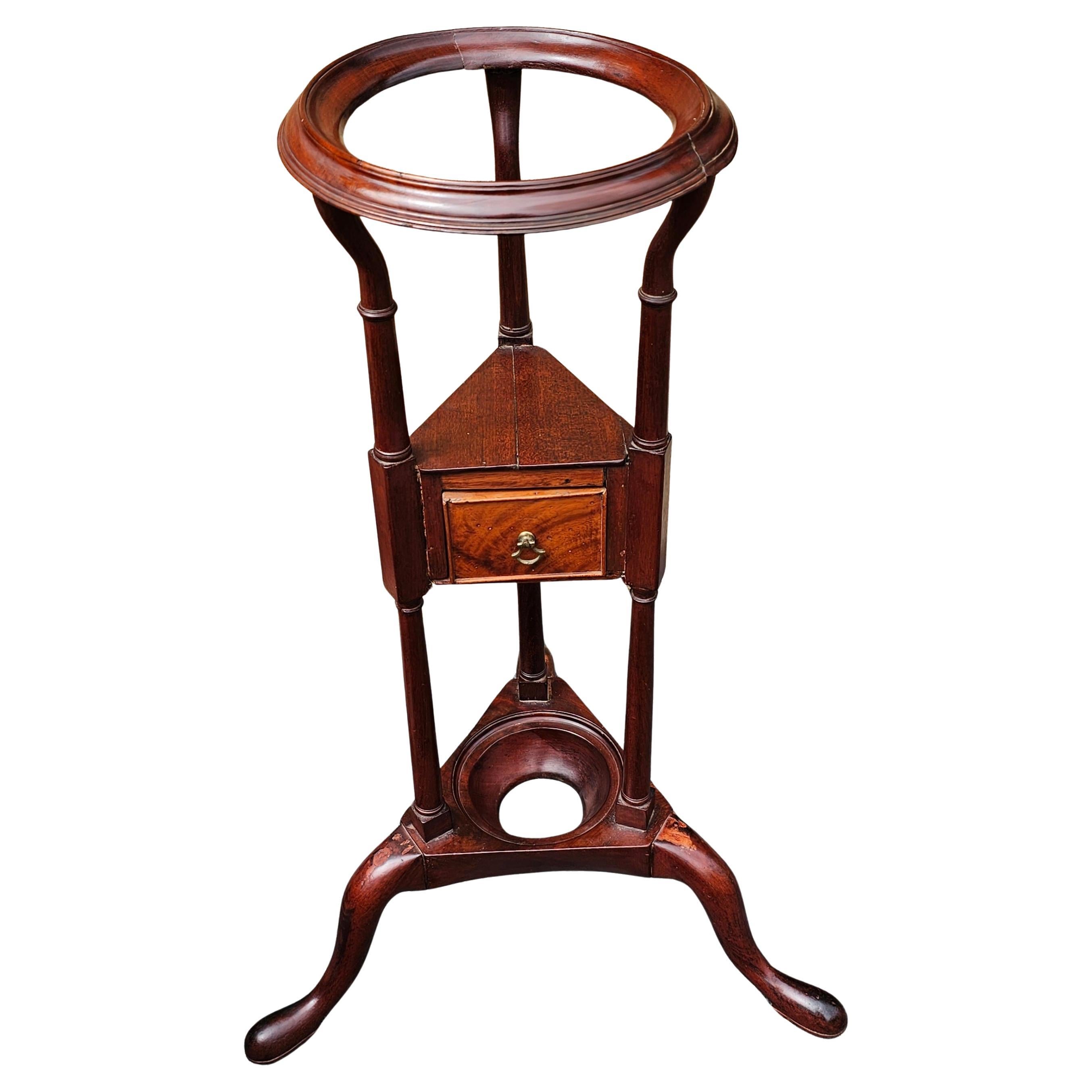  A fine quality 19th Century Mahogany English George III Style Basin Kettle Stand or jardiniere pedestal flower stand.
Measures 21.5