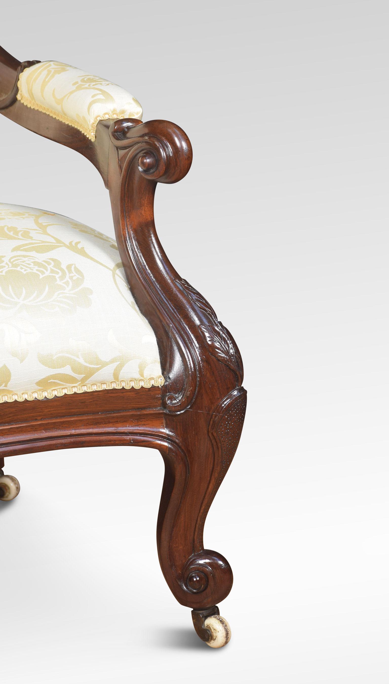 A mahogany settee, the oval upholstered buttoned back with scroll cresting, open arms above serpentine front. Raised up on cabriole legs terminating in ceramic castors.
Dimensions:
Height 37 inches height to seat 18 inches
Width 54 inches
Depth
