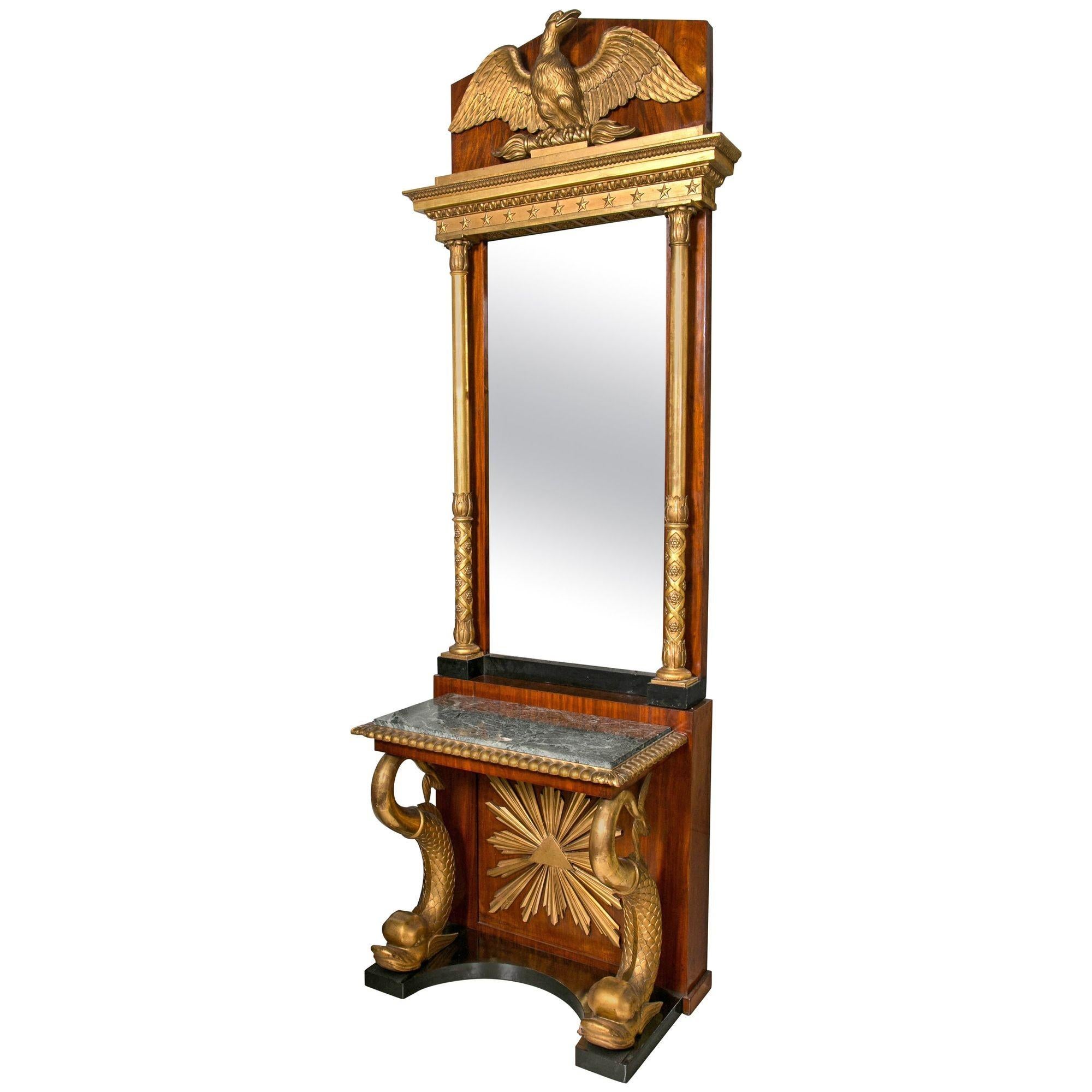 Firmato P & A. Bylanders, Göteborg, 1810 circa Console neoclassica svedese in mogano intagliato e legno dorato con specchio
Questa eccezionale consolle neoclassica svedese è un capolavoro unico nel suo genere. La base ebanizzata presenta un intaglio