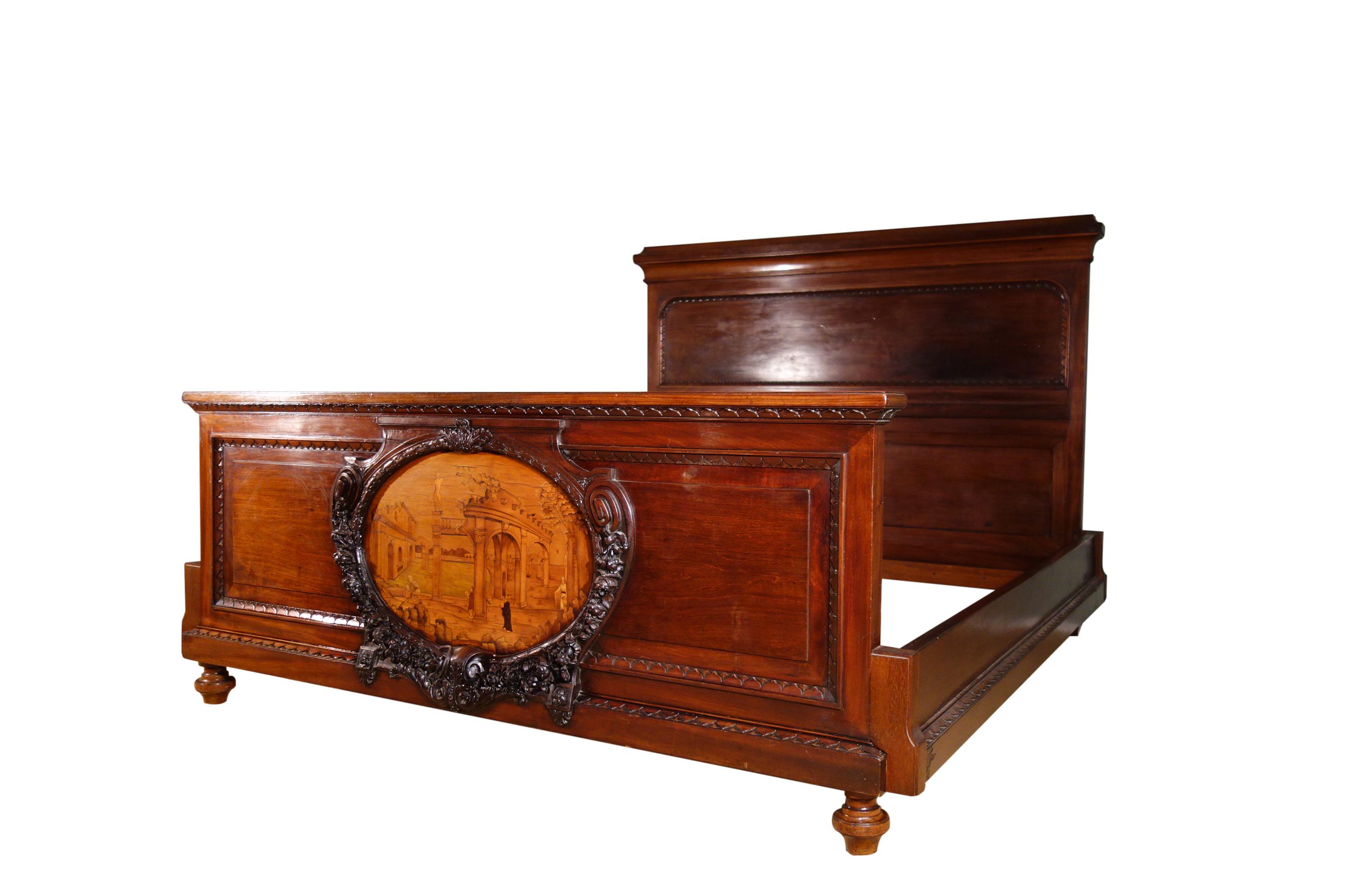 Impressive 19th century bed frame finely crafted of mahogany solids, including large older period salvage medallion of perspective marquetry composed in a variety of wood inlay species, attributed to the Giovanni Maffezzoli school ( circa